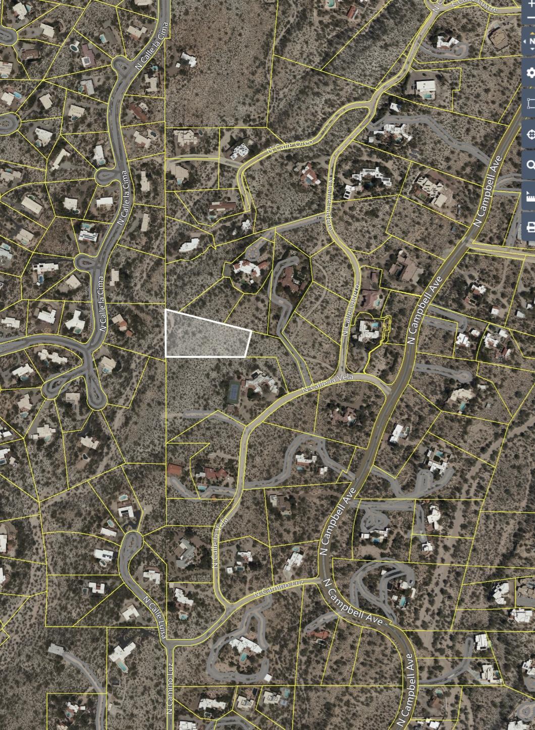 1.99 acre lot with exceptional mountain, city and sunset views located in the heart of the Catalina Foothills. Incredibly convenient location. Lot allows for one home to be built.  Land is adjacent to the noted ''Lee Marvin Residence'' located just off Campbell Avenue between the University of Arizona and La Encantada Mall.  Buyer to independently verify all desired information. Enjoy privacy and proximity at this convenient foothills location.