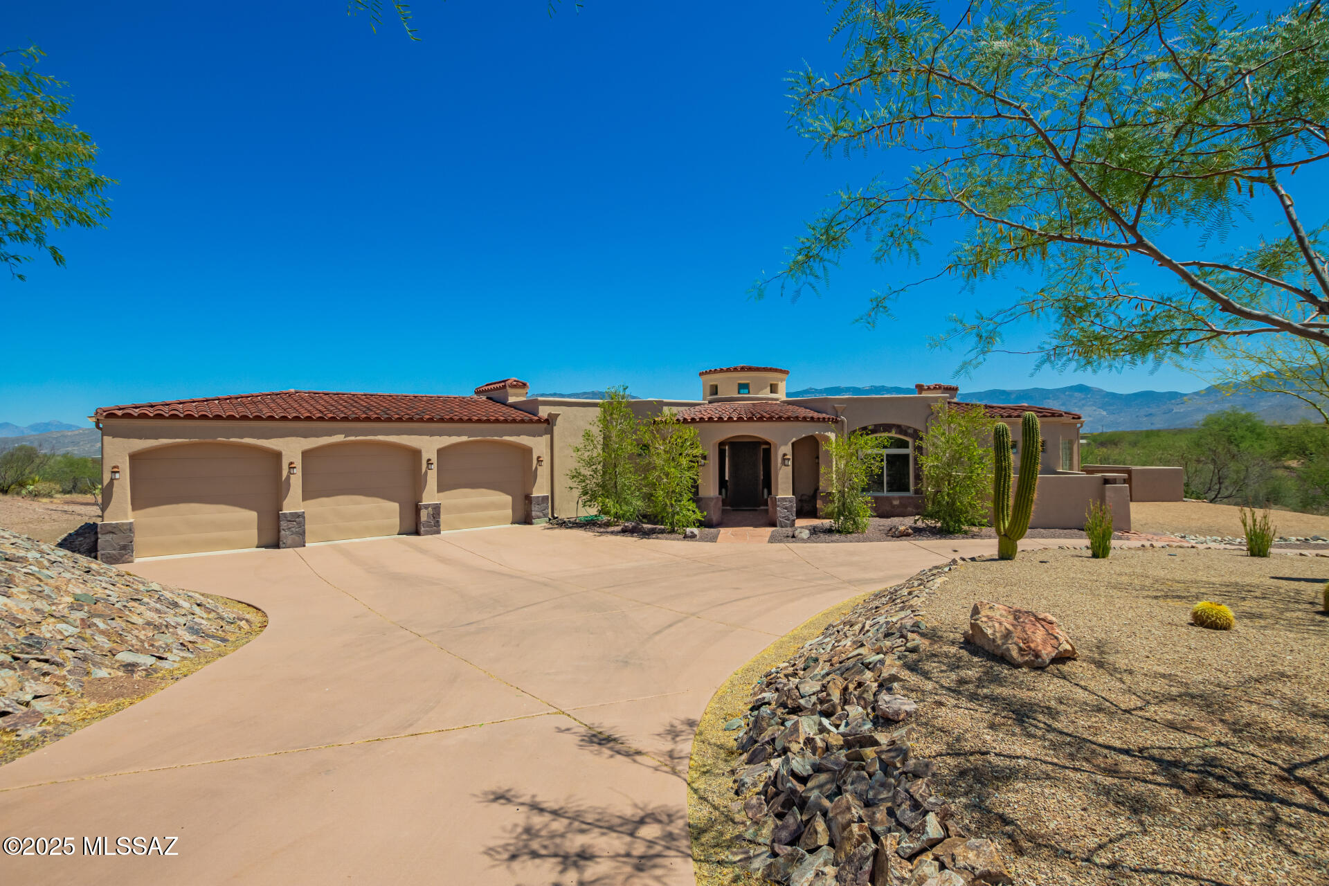Live the Dream in Mountain Creek Ranch Welcome to your private desert sanctuary in one of Vail's most sought-after communities! This custom 4-bedroom, 3.5-bath estate on 1.79 acres offers more than just a home—it delivers the lifestyle you've been dreaming of.

Wake up to breathtaking Rincon Mountain views and enjoy high-end finishes throughout, including travertine floors, Alder wood doors, granite counters, and stainless steel appliances. Every bedroom is an ensuite, offering ultimate comfort and privacy for family and guests. Working remotely or need flex space? You'll love the bonus rooms—ideal for a home office, gym, playroom, or all three. One guest suite even features a Murphy bed with a built-in desk, ready to transform from workspace to guest room in seconds. Outside, unwind in your resort-style backyard with a heated pebble-tech saltwater pool, soothing waterfall, and expansive patio spaceperfect for both relaxation and entertaining year-round.

Other perks? Paid-off solar, a circular driveway, oversized 3-car garage, and generous storage throughout. Whether you're a growing family, remote professional, hobbyist, or someone ready to escape the hustle for wide-open skies and starry nights, this home offers it all.

Space. Style. Serenity.
Don't just dream about itcome experience it.