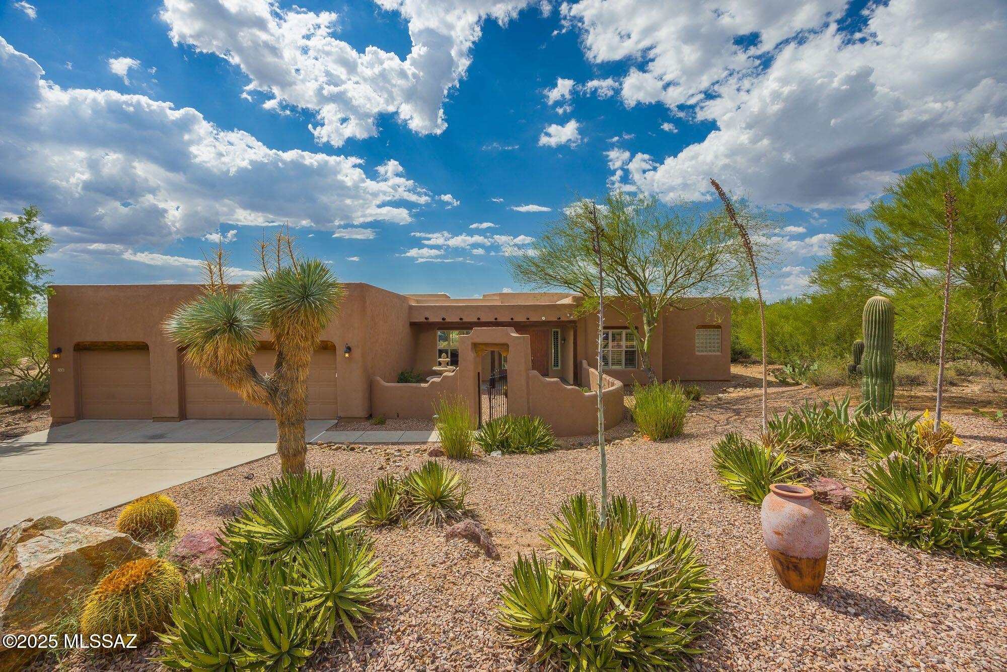 Nestled in the prestigious Chaparral Heights Community on an Acre plus premium lot in cul-de-sac. This T.J. Bednar home features his southwest flair of viga beams with soaring wood plank ceilings, pine wood interior doors & beehive fireplace.  The kitchen is a chefs dream with 5 burner gas range ,spacious pantry, loads of cabinets, granite counter tops, plus breakfast bar and cozy breakfast nook. Home has split bedroom plan with formal living & dining rooms plus a den, ceilings fans throughout and very spacious 3 car garage. Roof replaced 3.5 years ago. Rear yard offers views of Tucson and Tortolita Mountains and gorgeous sunsets with room for a pool, gated front courtyard has Catalina Mountain views. Location is excellent with lots of privacy and nearby schools, shopping and restaurant