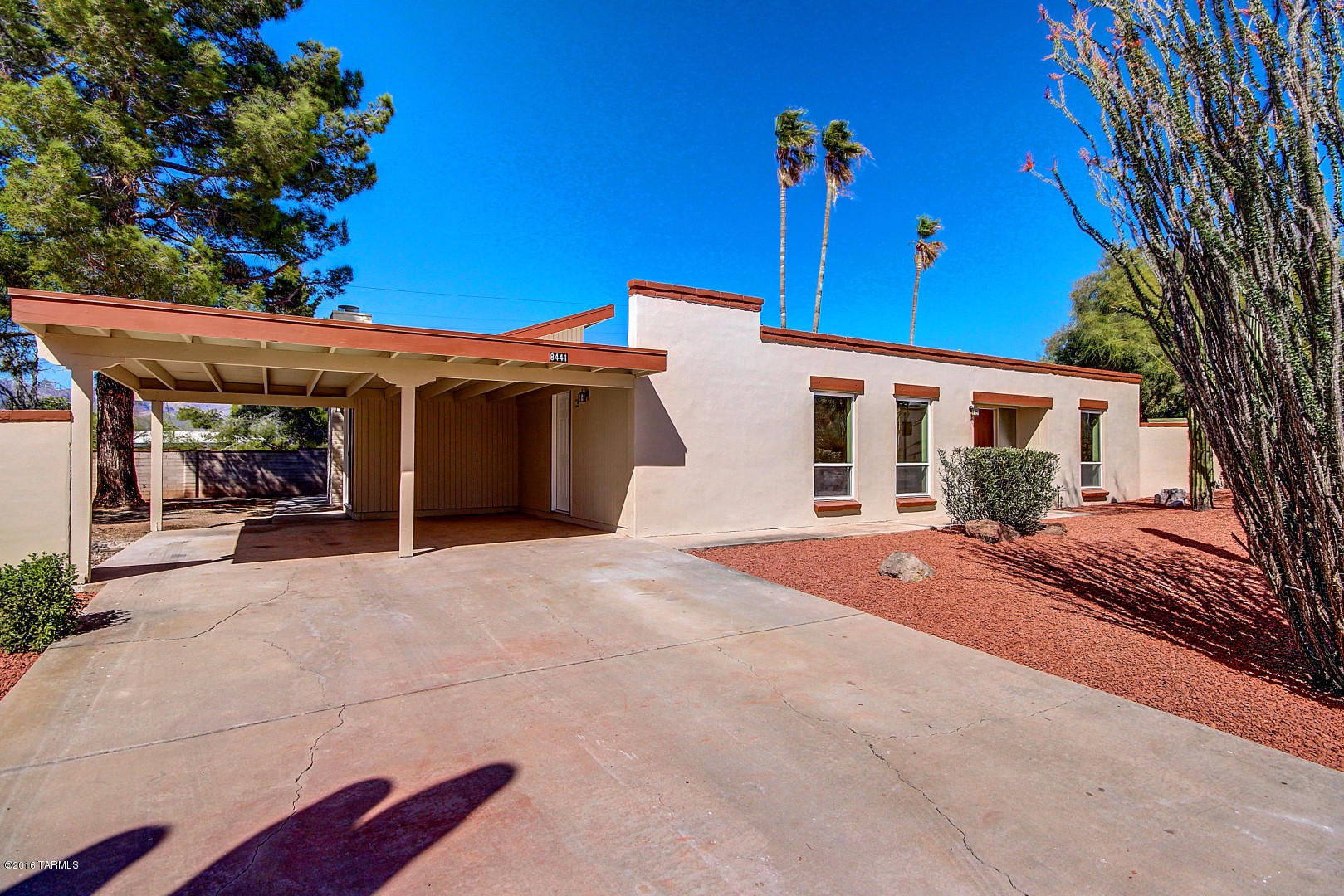 Seller will accept or counter offers between $200,000 and $210,000. Beautiful newly renovated East Tucson home with warm paint tones, tile & wood flooring and two fireplaces! Upgraded eat in kitchen offers stainless steel appliances, granite counters and custom cabinetry. Each spacious bedroom has plush carpeting and picture windows. Master bedroom includes a private exit and adjoining bath. Both baths have tile surround showers with decorative accents. Fantastic backyard has a covered patio, refreshing blue pool and low care desert landscape! This home is move in ready and waiting for you! See it today and start packing!