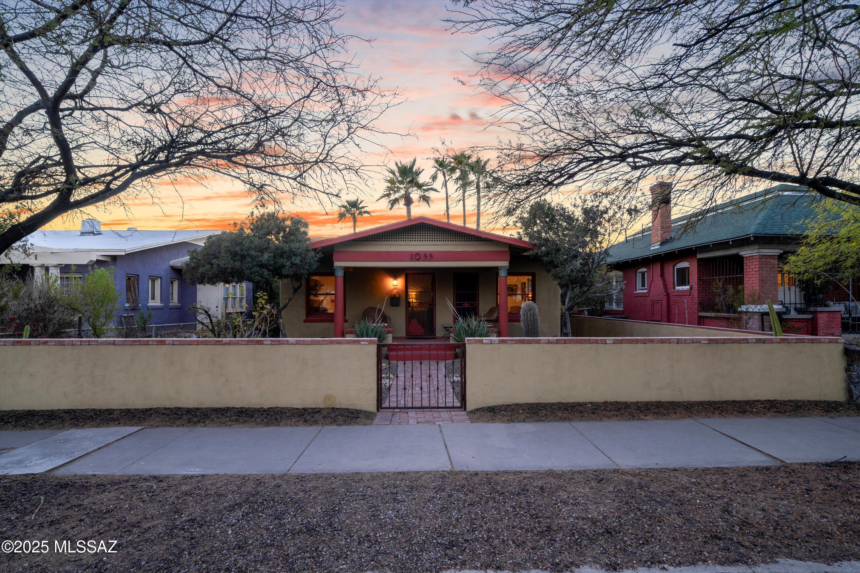 U OF A  Amazing opportunity! STUDENT HOUSING, HOME OFFICE, FAMILY COMPOUND. Two houses for the price of one.  Own your own 4th Ave 2 bedroom, 2 bath with den home AND a separate 3 bedroom, 3 bath guest house! This property has all the historical allure of 4th Ave with modern improvements. 1,151 sq ft home is remodeled and updated, with a perfect blend of modern and 1920 period and features your own private back yard and porch with sparkling blue pool.
1,383 sq ft guest house has its own address, 1024 N Herbert Ave, its own gated entrance and oversized garage and doors. THIS IS A MUST SEE!!!