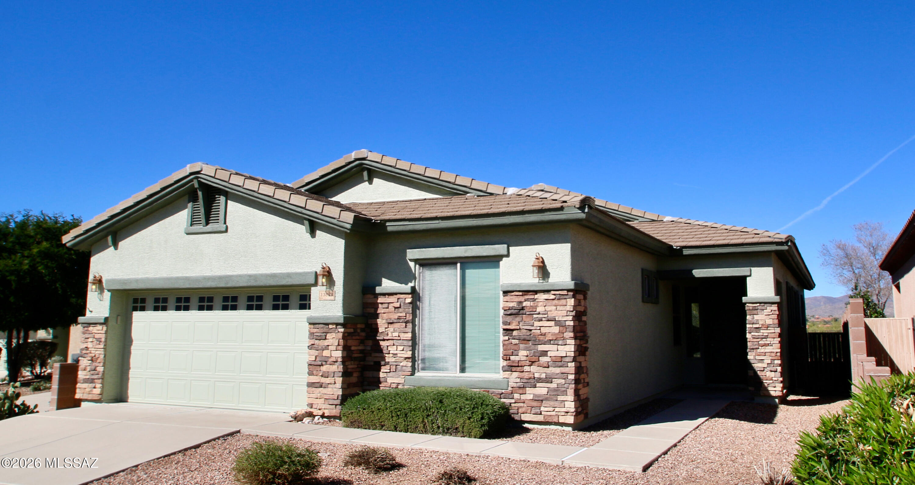 Recently updated with a freshly painted exterior and offered at a fantastic price! This beautiful single-story home in the exclusive gated Vista Mirabella enclave of Rancho Vistoso, Oro Valley, offers comfort and style with 3 bedrooms, 2 baths, and a spacious 3-car garage. The open floor plan features a bright, inviting living area and a large kitchen island--perfect for entertaining. Enjoy year-round comfort with a brand new AC installed in September 2025.
Take in breathtaking sunset views over the Tortolita Mountains from the backyard and sunrise vistas of the Catalina Mountains from the front. The home backs up to a tranquil 27-mile wash, offering privacy and a direct connection to nature. With over 1,900 sq ft of living space, this property is nestled in a quiet, highly sought-after neighborhood. Move-in ready and freshly painted, this home is an outstanding value--don't miss your opportunity!
