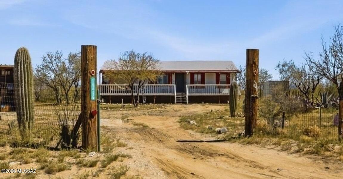 Home On The Range! This Lovely Home Sits On Over 4 Acres Of Private Land, With A Storage Shed & Shipping Container Included With The Sale. Enjoy Breathtaking Views On Your Very Own Ranch, That Already Has Gardening Beds & Animal Pens! The House Itself Is Open, Spacious, And Has Large Bedrooms (With A Split-Floorplan). The Owners Installed Security Cameras, And Are Currently Using The Giant Carport As A Fenced-In Dog Area (But It Can Easily Be Converted Back To A Carport). One Of The Nicest Properties In Three Points, And One Of The Few Properties Left Under $250,000!