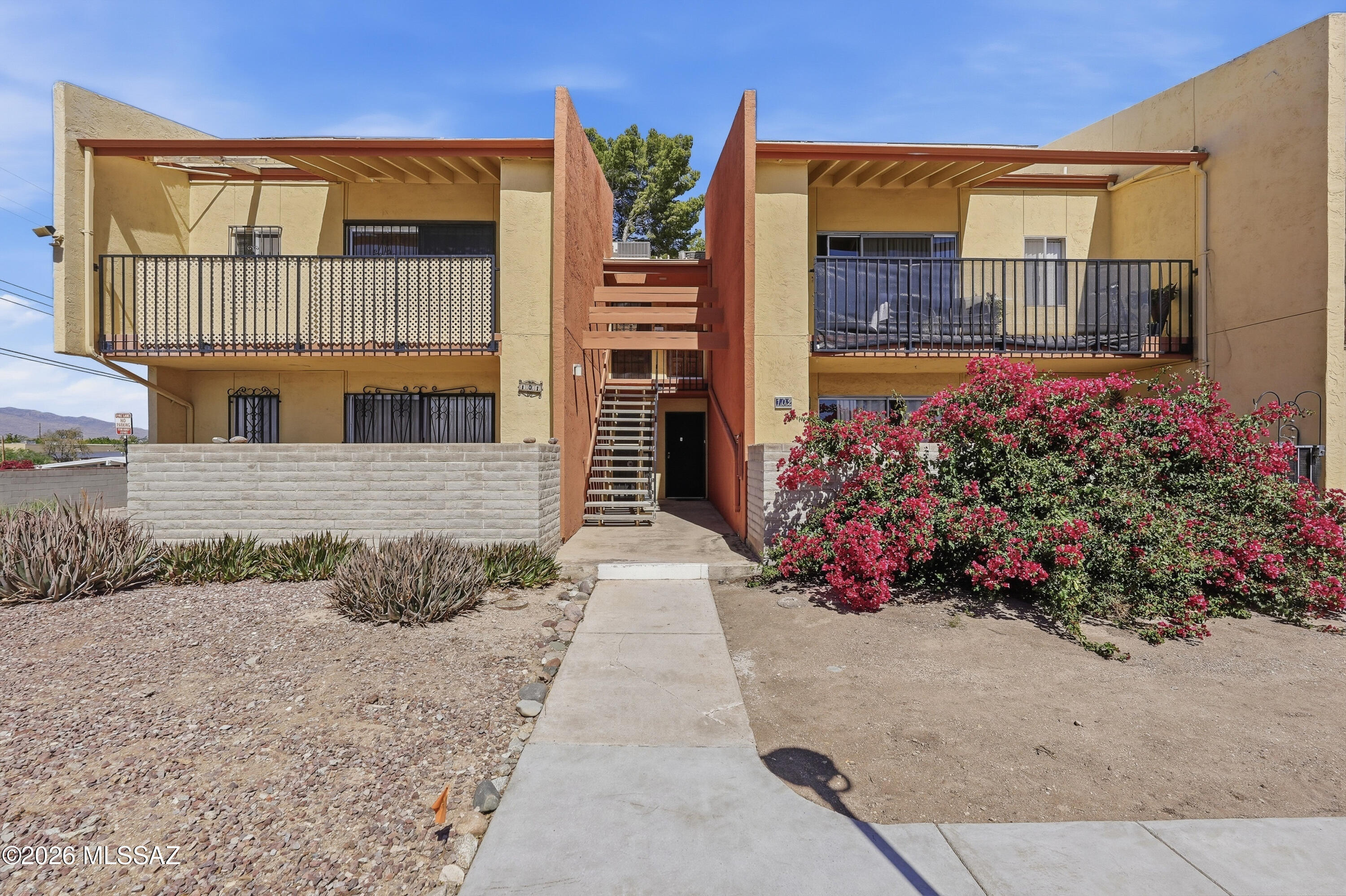 No Application Fees! Remodeled second floor 2-bedroom, 2-bathroom Tucson condo located in the Langley Gardens Condominiums community. This home features laminate flooring throughout with no carpeting, vaulted ceilings, ceiling fans throughout, neutral paint, upgraded fixtures, and excellent natural lighting. Spacious living room includes direct access to the private balcony and adjacent dining area creating an open living space. Kitchen features ample cabinet space, gas range, dishwasher, refrigerator, pantry, and generous counter space. Both bedrooms provide direct access to their own bathrooms creating an ideal split floor plan layout. Single unit washing machine and dryer combo included for convenience. Private storage room located off the balcony provides additional storage space. Langley Gardens Condominiums features community pool and spa access along with beautifully maintained common areas. Convenient east Tucson location close to shopping, restaurants, parks, schools, public transportation, and easy access to major Tucson roadways and employment corridors.

All Denali Real Estate residents are automatically enrolled in the Resident Benefits Package (RBP) for $55.00/month which includes Renter's Liability Insurance, Credit Building to help boost the resident's credit scores with timely rent payments, up to $1M Identity Theft Protection, HVAC air filter delivery (for applicable properties), our best-in-class resident rewards program, and much more!