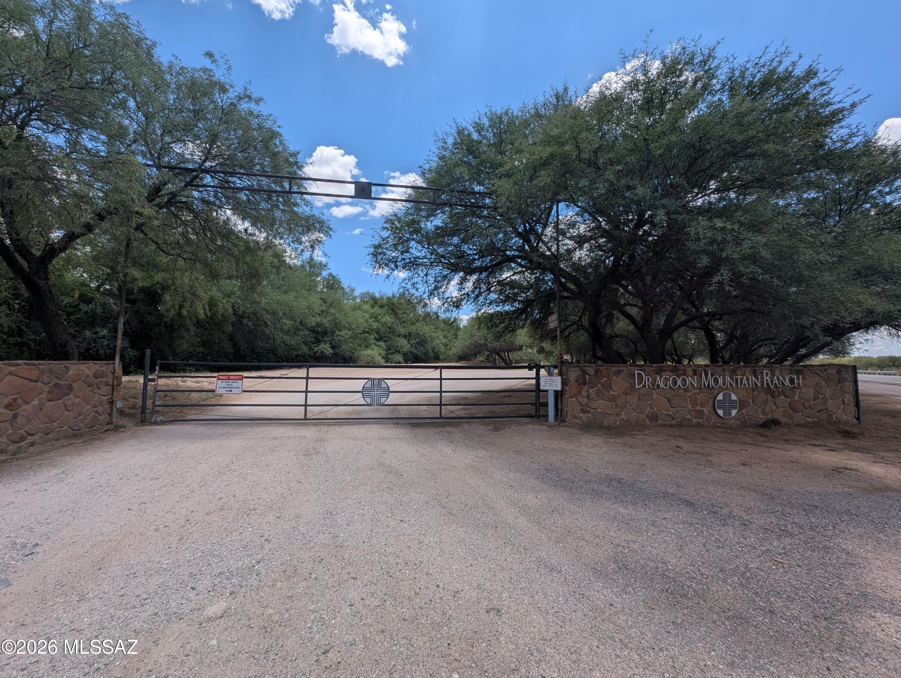 Nestled in the secure, gated Dragoon Mountain Ranch, this pristine 36-acre homesite offers the ultimate canvas for your desert estate or equestrian sanctuary. The gently rolling landscape boasts RU-4 zoning, granting the freedom for custom residential builds, agriculture, and horses. Here, you will enjoy unfiltered panoramic mountain views and unparalleled privacy, completely free from city noise. While offering a peaceful off-grid feel, you are never isolated--the property sits just a scenic 15-minute drive south of Benson, ensuring local shopping, dining, and Interstate 10 amenities are always within easy reach.
