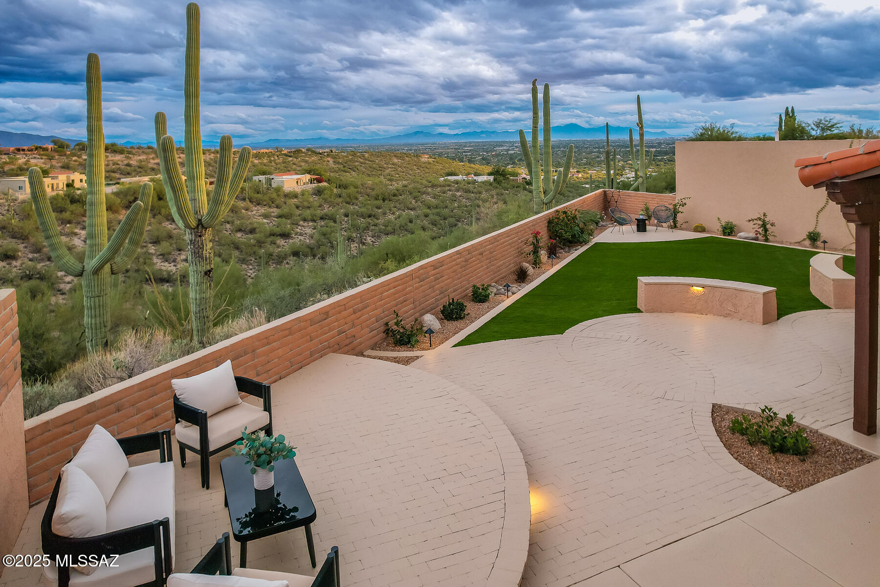 Perched atop a Ridgetop in Tucson's coveted Catalina Foothills, this renovated Townhome delivers gorgeous mountain vistas & sparkling city-light panoramas. This gorgeous home has been transformed through a comprehensive, high-end renovation that brings luxury, comfort & modern sophistication to every room, with a refreshing, warm palette. The newly reimagined floorplan offers an open, flowing layout w/ soaring ceilings & elegant finishes. All-new kitchen features quality custom cabinets, stunning granite counters & KitchenAid Appliances. New backyard design created many inviting landing spots, including an elevated view patio perfect for the unforgettable vistas. Sought after Fairfield Sunrise East offers incredible amenities including 2 Pools, Tennis, Pickleball and new Bocce Ball Courts