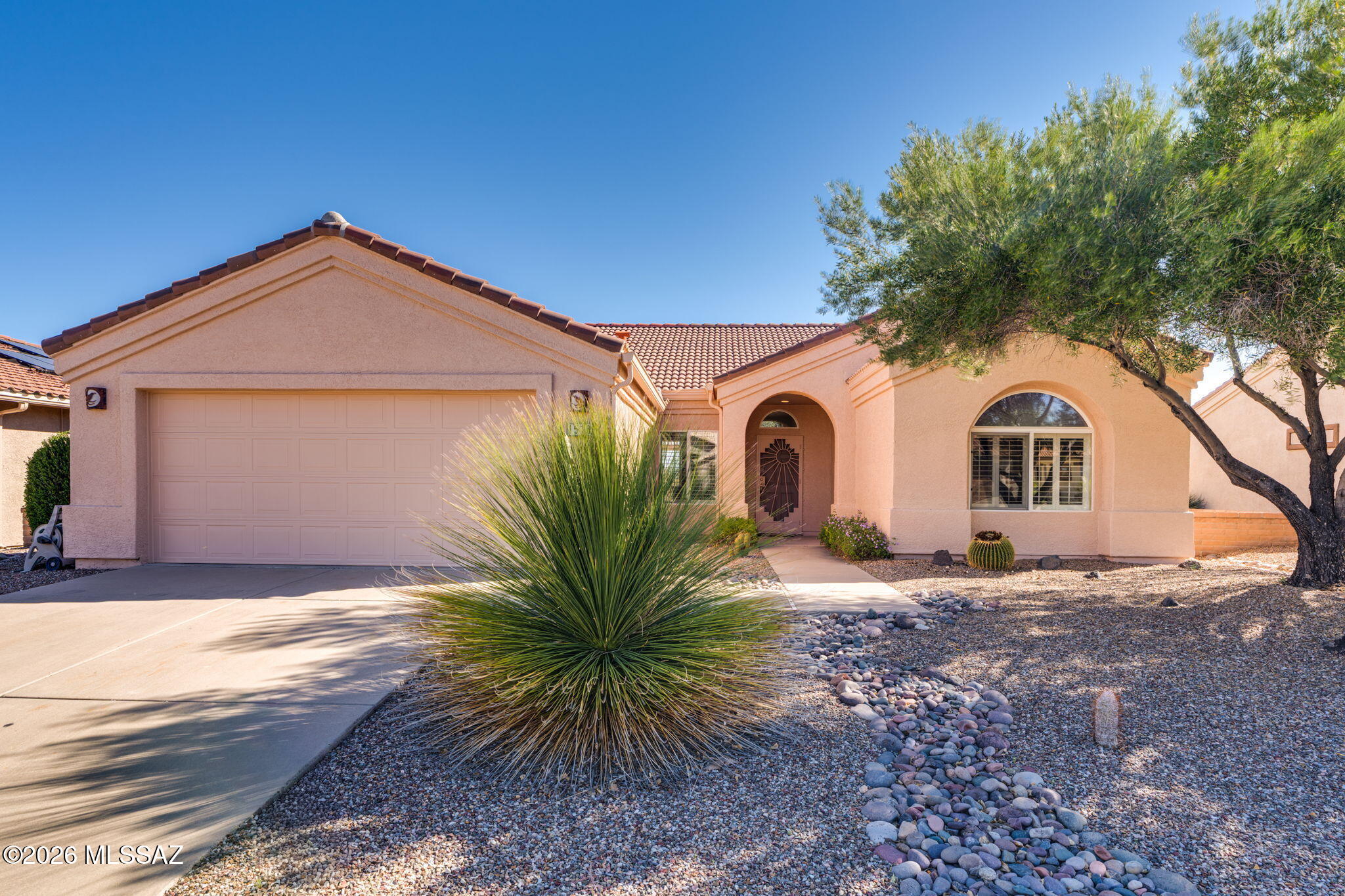 Welcome to your desert retreat! This beautifully maintained 2-bedroom, 2-bath + den home offers 1,588 sq ft of comfortable living space that was thoughtfully built in 1999. Perfectly situated on the golf course, you'll enjoy breathtaking, unobstructed views of the lush greens and the stunning Santa Rita Mountains right from your own backyard. Step inside to find a light-filled interior featuring plantation shutters, ceiling fans throughout, and a functional layout designed for both relaxation and entertaining. The home is equipped with newer appliance & transome windows making the kitchen both stylish and practical for everyday living. Recent upgrade includes a brand-new roof installed in 2025, offering peace of mind for years to come. Outside, the fully walled-in yard provides security, w , while the covered patio creates the perfect space to unwind, dine, or take in the picturesque surroundings. Whether you're looking for a full-time residence or a seasonal getaway, this home offers a great combination of location, comfort, and value.

Residents of Quail creek enjoy an unparallel resort lifestyle, including championship golf, indoor and outdoor pools, tennis, pickleball and bocce courts, a dog park, creative arts center, on-site dining, scenic walking paths, bike lanes, and a vibrant calendar of social events.