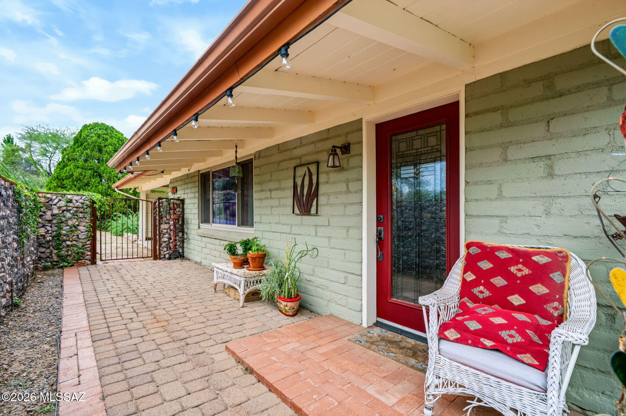 Discover a cozy retreat with easy access to everything Southern Arizona has to offer. This inviting 2-bedroom, 1.5-bath home features a warm wood-burning fireplace, an Arizona room for added living space, and a spacious backyard ready for entertaining, gardening, or simply enjoying the fresh desert air.

Conveniently located near SR-82, enjoy an easy drive to Rio Rico, Patagonia Lake, Patagonia, Sonoita, and beyond. Downtown Nogales is approximately 5 minutes away, while Mariposa Road shopping, dining, and services are about 10 minutes away. A comfortable home in a central location. Come see the possibilities!