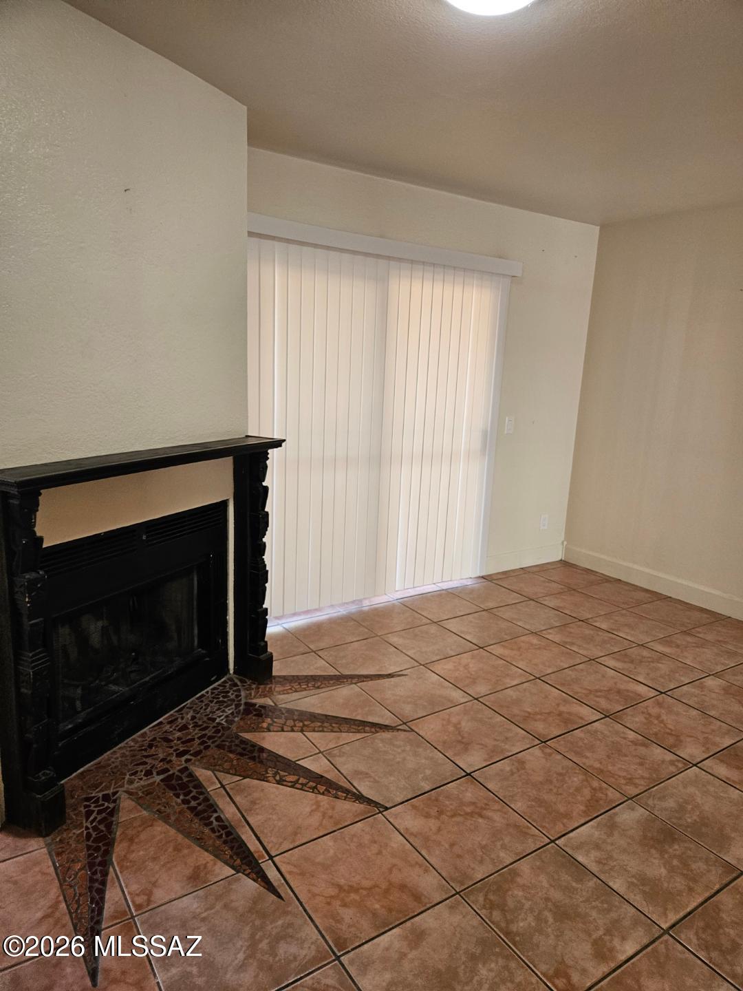 Welcome to The Village at Midvale. A very desirable area in Southwest Tucson. This 2bd,2ba condo is downstairs. This home is 1019 in square feet but feels even bigger with its tall ceilings. It has been freshly painted with new carpet, blinds and other touches throughout the home. Kitchen has a bay window for a more open feel. Kitchen has lots of storage. Home comes with washer and dryer. Master has Bay window and walk in closet. There is a covered patio with storage. Each home comes with 1 covered parking space. Community has pool and spa for your enjoyment. Home is close to schools, transportation, shopping and restaurants. Put this home on your must see list.