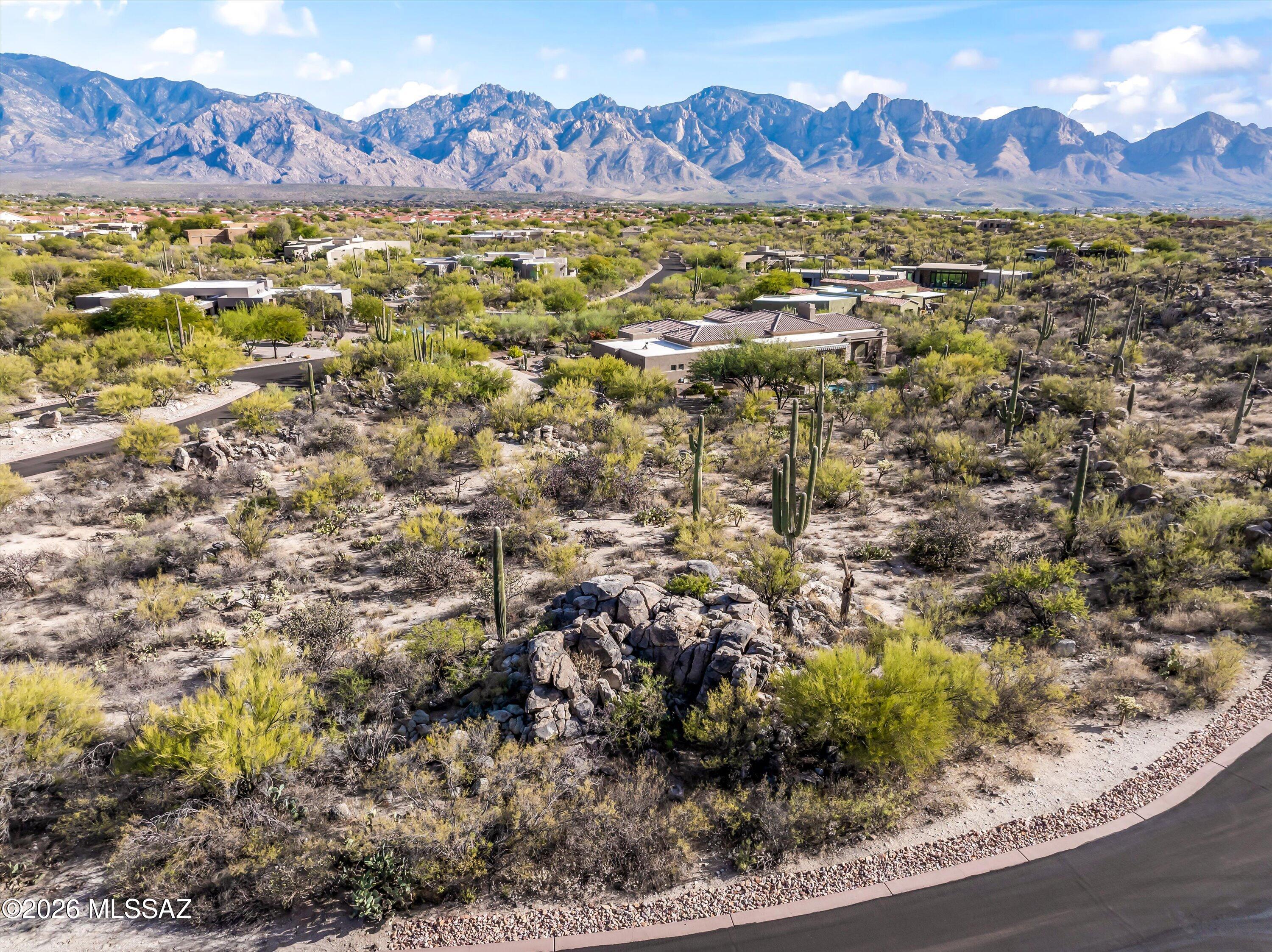 Exquisite Easy-to-Build on luxury lot situated in the gated Honey Bee Ridge Community. Enjoy expansive views, Sonoran Desert Vegetation with many Saguaros and interesting rock outcroppings, with workable topography. All utilities are located at the lot. Choose one of Insight Homes' existing customizable floor plans or Insight Homes will design/build to suit on this lot. Call listing Agent to learn about all the plan options and estimated build costs.  *See MLSSAZ #22614164 for example of home to be built.