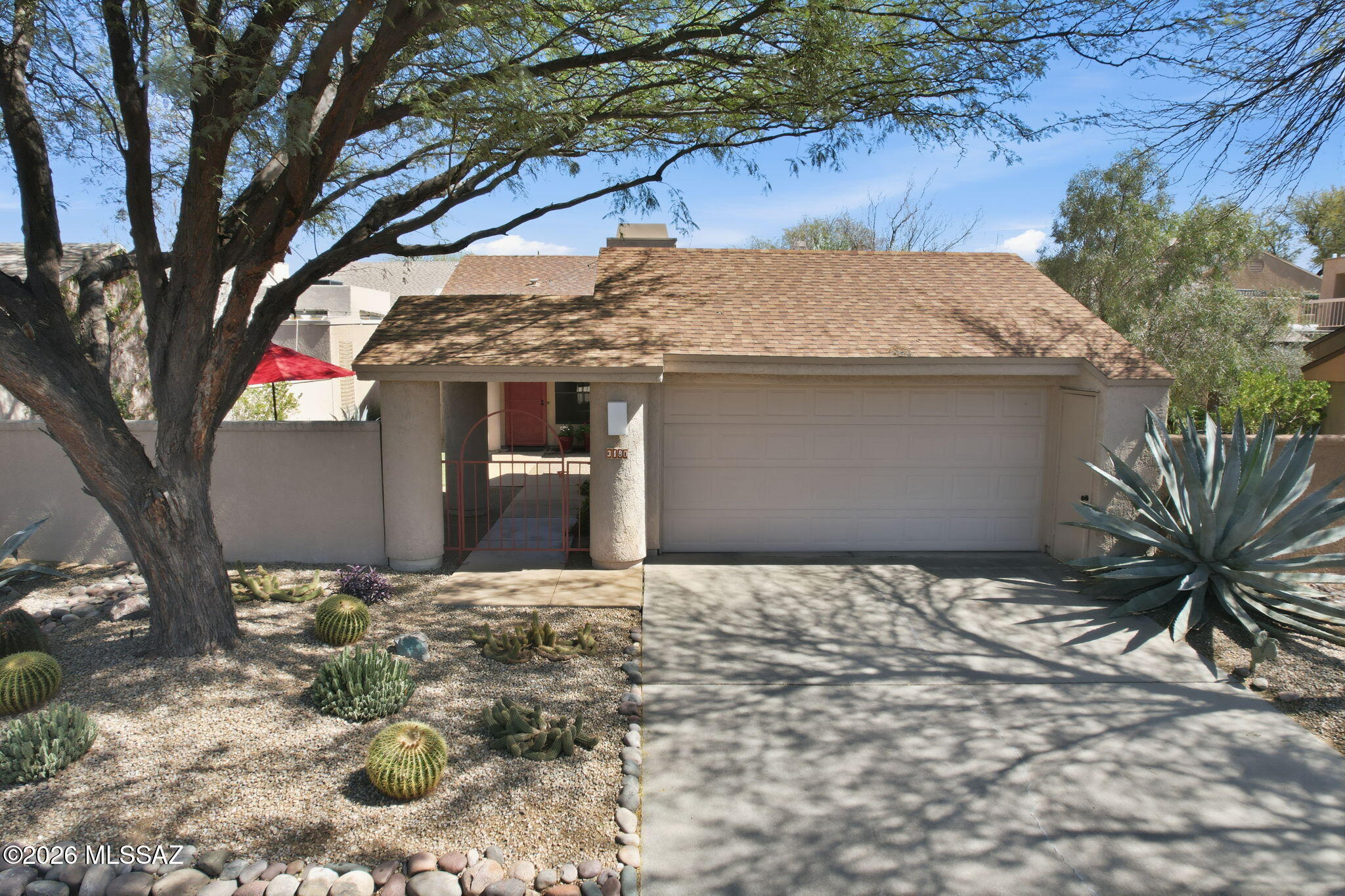 Located in the coveted Bosque Creek Ft. Lowell Historic District this high quality remodel will delight the most discriminating buyer. The beautiful front courtyard adds extra privacy and beauty with a Tombstone rose bush as you enter the home. High ceilings and gracious patio areas accessible from both the kitchen and primary suite provide the indoor outdoor living spaces appreciated in Tucson. Kitchen remodel includes cherry cabinets, granite countertops and stainless appliances. Bathroom remodels feature pedestal sinks, Italian tile and Toto toilets. Ample closet space and an extra dressing area add efficiency to beauty. Electric shade covers and a peak of the Catalina mountains give extra charm to the back patio. The nature preserve, the community pool and the River Walk/Loop close by.