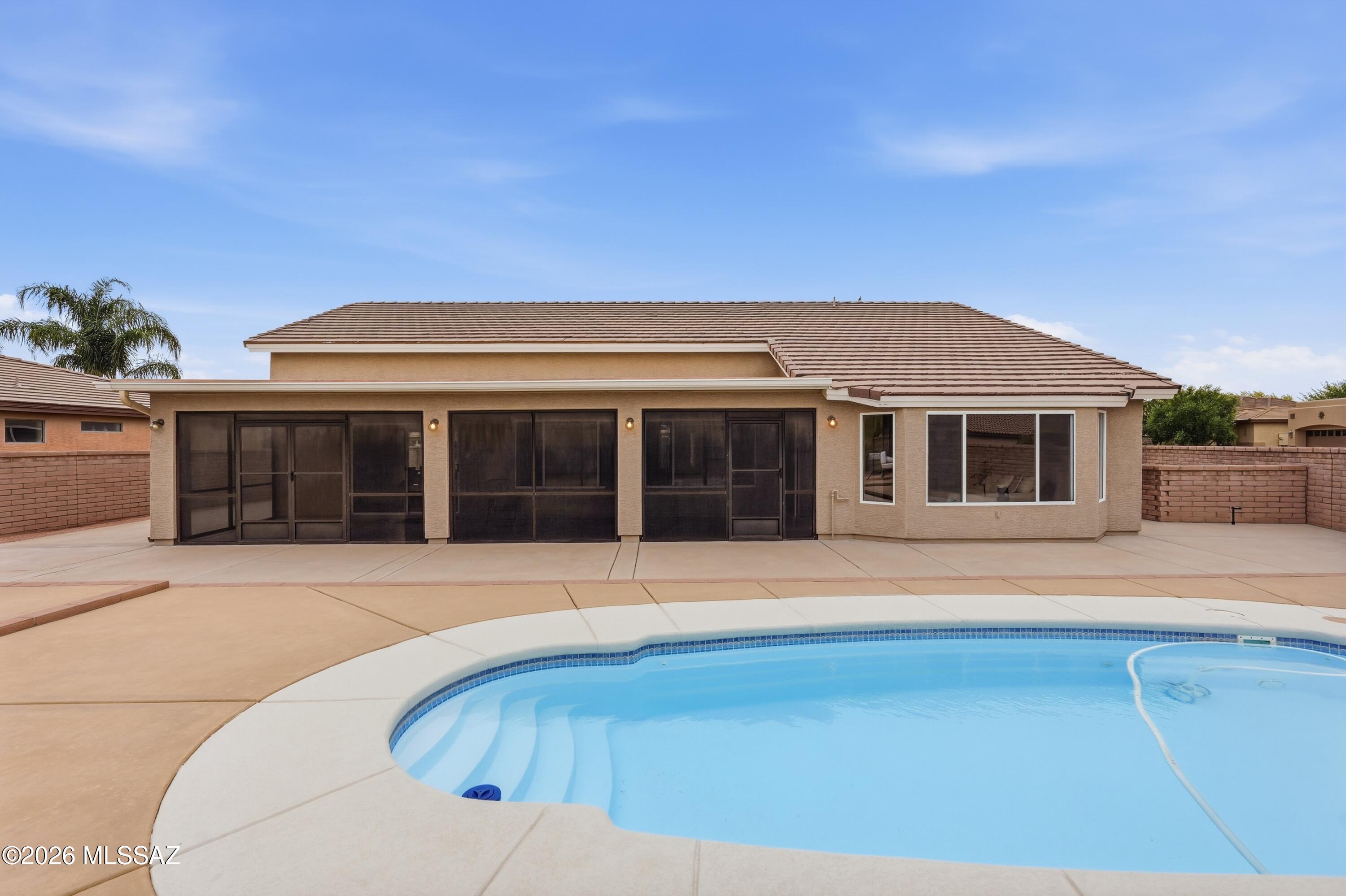 Where life slows down and outdoor living takes center stage... this private pool home in Quail Creek delivers the Arizona lifestyle buyers are searching for.
Tucked on a desirable corner lot, this original-owner home offers 2,361 sqft, soaring ceilings, and a flexible layout with 2 bedrooms that easily converts to a third bedroom plus a light-filled den. 
Step outside to your own backyard retreat complete with a sparkling fiberglass pool  perfect for relaxing evenings or entertaining under the desert sky.
Inside, natural light fills the open living spaces, creating an easy, comfortable flow designed for everyday living and hosting.
A 2.5-car garage provides extra space for a golf cart, storage, or hobbies--ideal for enjoying everything this active community offers.
Located just a shor golf cart ride from the Quail Creek golf course, clubhouse, and world-class amenities, this home offers the perfect balance of space, privacy, and lifestyle.
An incredible opportunity to make it your own in one of Green Valley's most sought-after communities.