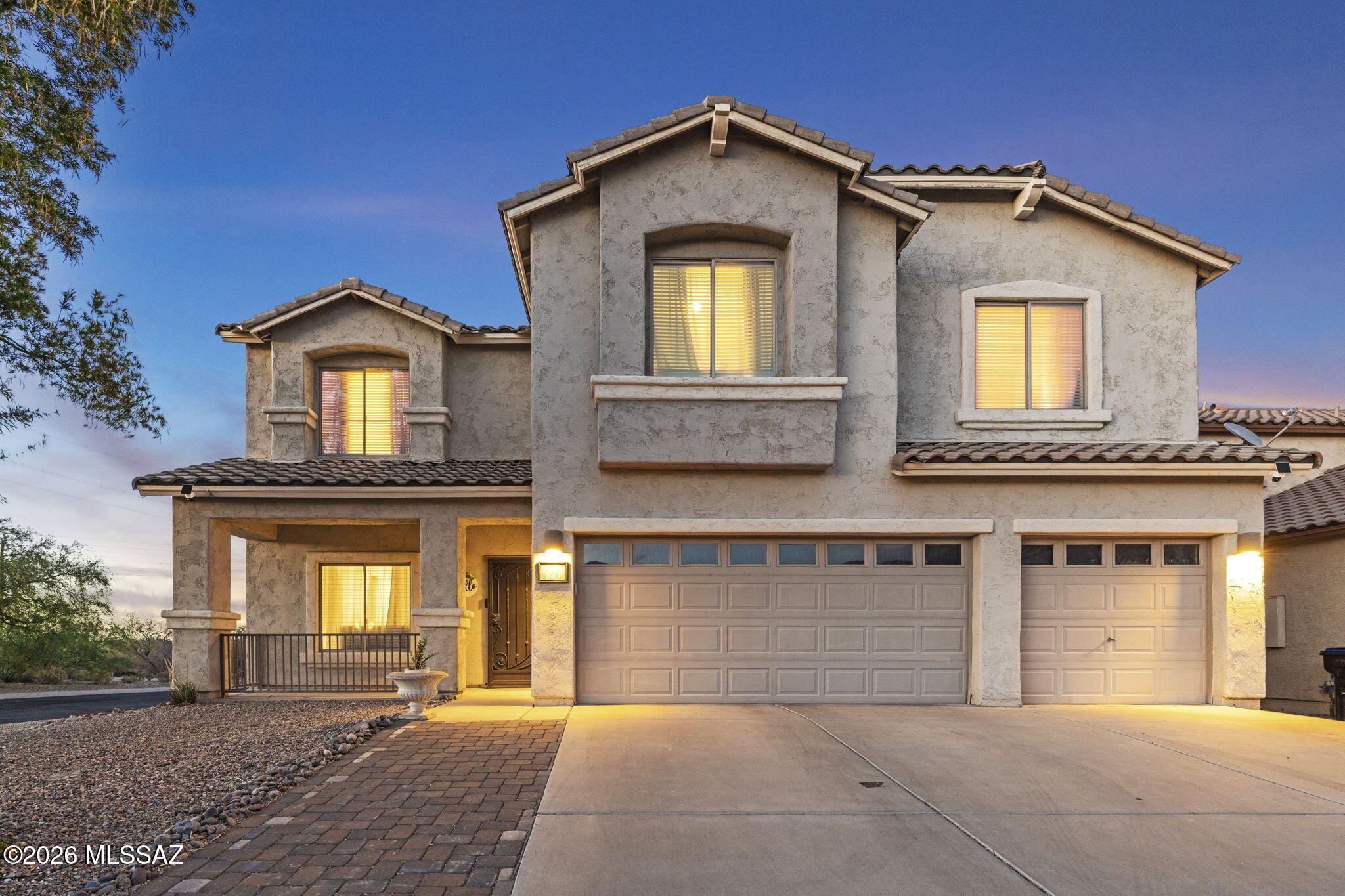 Range Priced-Seller will accept/or counter offers b/w $429,000 & $450,000. Interest Rate buy down possible, depending on offer. Welcome to this expansive & thoughtfully designed home, offering 5 Bedrooms, 4 Baths, a Loft & a Den (opt. 6th bedroom) That is sited at a desired corner lot. Tons of flexible spaces for work, play, and relaxation. This corner lot location overlooks open desert and delivers privacy and beautiful natural views. The professionally landscaped backyard features artificial turf and pavers for effortless outdoor living. Inside, abundant natural light fills each extra large room plus the modern kitchen features plenty of counter & cabinet space. Recent updates-include new water heater and a 2-year-old HVAC.  Located in Rancho Sahuarita with unmatched community amenities. When you live in Rancho Sahuarita, you belong to a community with access to three pools including one of the region's largest private splash parks, eleven parks, trails and paths for walking and cycling, and Club Rancho Sahuarita, our highly amenitized community center for residents and their guests to enjoy.
Community Amenities Include (from Rancho Sahuarita website):
Club Rancho Sahuarita
Located in the heart of the community is Club Rancho Sahuarita, which features a full fitness facility, meeting rooms, the Anza Sports Bar, our Kids Club children's facilities, athletic courts, a playground and Adventure Park, a full lap pool, and a Splash Park complete with water slides.

Parks and Trails
Rancho Sahuarita residents frequently rank our park and trail system as one of their favorite parts of the community. Two large neighborhood parks, 9 pocket parks, green spaces throughout the neighborhoods and 17 miles of walking and cycling trails. Trail system connects most of our parks and neighborhoods through a series of paths. These include the Safari Trail, the Wilderness Trail, and Anza Trail and others.

Neighborhood Parks and Pools
Rancho Sahuarita has two mini-recreation centers, located at the Parque Del Rio and the Parque Del Presidio. These centers are complete with pools, spas, basketball and sand volleyball courts, picnic areas, open space and playgrounds.
Various events are also held here, like outdoor fitness classes and special events. For more information, please visit the Event Calendar on ActiveNet or check out what's new on the Rancho Sahuarita app!

Other Neighborhood Amenities:
The Armed Forces Tribute, which opened on July 4, 2016 with a private dedication ceremony, is dedicated to each branch of the Armed Forces: the Army, the Navy, the Air Force, the Marines and the Coast Guard. The new tribute and will present our community the chance to honor the veterans and active duty service members amongst us. Many other communities around the country have various types of physical tributes to honor the Armed Forces, and this is Rancho Sahuarita's opportunity to do the same tribute.

At the Parque Del Rio amenity, resident families can also enjoy the Flamingo Splash Pad.

This splash pad is is the shape of a semi-circle, and is made up of three colors. The centerpiece of the splash park is the addition of two 12-ft tall pink flamingos, and a series of special jets built into the pad which spray water upwards out of the deck.

You're invited to more than 320 events every year, plus free fitness and exercise classes at Club Rancho Sahuarita.

Give your family a life they'll love in Rancho Sahuarita, an award-winning community!