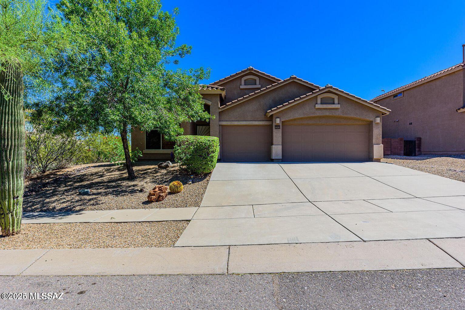 Phenomenal 4 bedroom 2 bath home in desirable Sycamore Canyon. Open, spacious floor plan w/vaulted ceilings, neutral palette & ceramic tile throughout. Formal living/Dining rooms, T/V room/Den w/patio access, eat in kitchen w/breakfast bar, all appliances, granite counters, open shelving. Grande Primary suite w/walk in closet, primary bath offers dual undermounted sinks w/granite vanity, private access to backyard, large linen closet. Larger addtl bedrooms, A/C, 3 car garage, elevated lot, Vail School District. Covered back patio, double side gate, fire pit, new turf are just some of the amenities of this property. This backyard is fantastic for entertaining or enjoying the peaceful tranquility of the desert sunsets & mountain views.