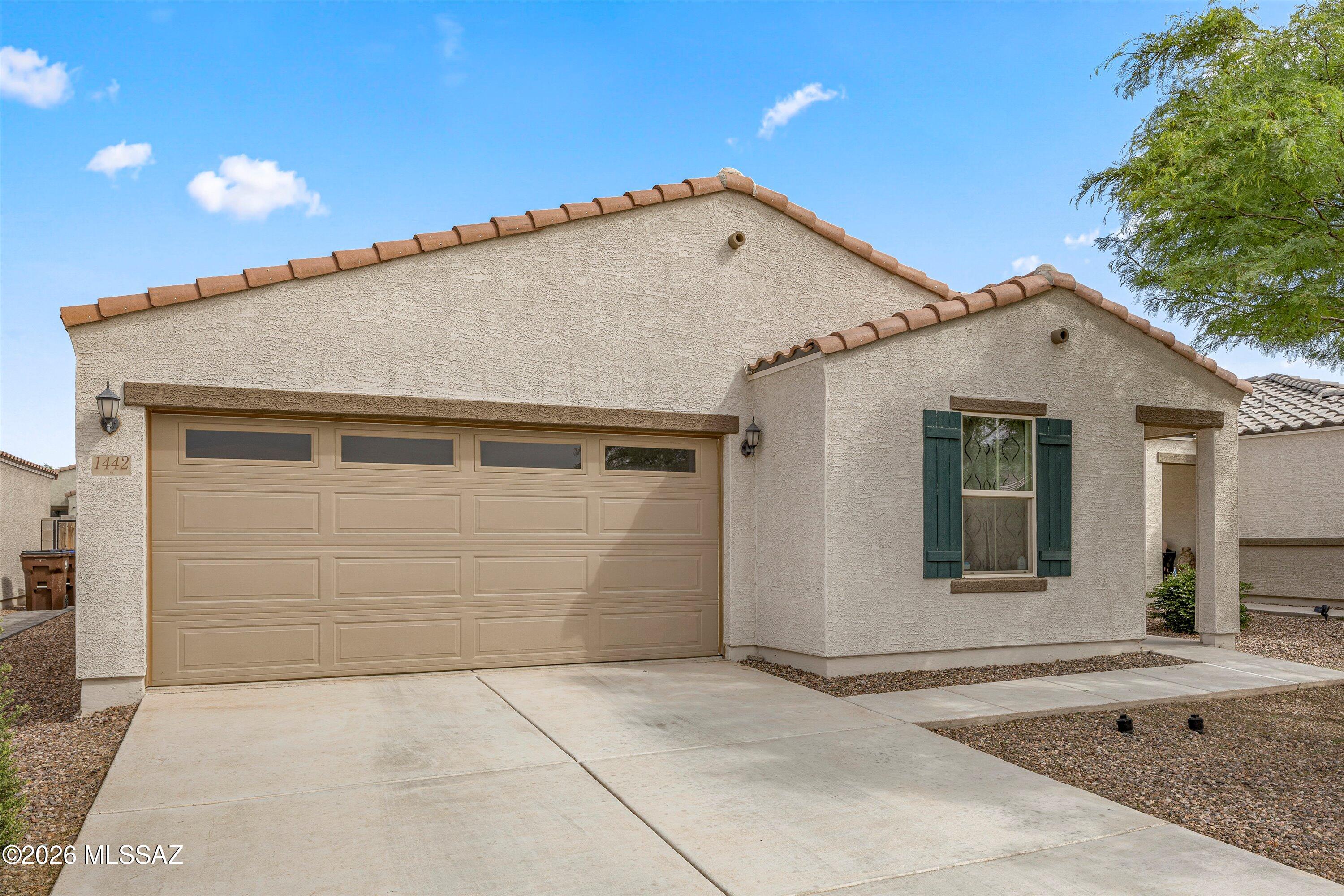 Welcome to this beautifully maintained 3-bedroom, 2-bath home located in the charming rural community of Coolidge within the desirable Heartland Ranch. Built in 2021 by KB Home, this thoughtfully designed residence offers 1,605 square feet of modern living with quality upgrades throughout. Step inside to find upgraded ceramic tile flooring, rich maple cabinets, upgraded laminate countertops, and custom paint that adds warmth and personality to every room. The spacious primary suite features an upgraded tiled shower, creating a comfortable and stylish retreat. Situated on a large lot, the backyard is a blank canvas ready for your vision, whether you dream of creating an outdoor oasis, entertaining space, or garden. Enjoy the benefits of newer construction with the added value of meticulous care and thoughtful upgrades. A 1-year home warranty with Old Republic Home Protection is included for added peace of mind. This home is also eligible for FHA, VA, and USDA, making it an excellent opportunity for a wide range of buyers. Don't miss your chance to own a move-in ready home in a growing community with room to make it your own. Schedule your showing today!