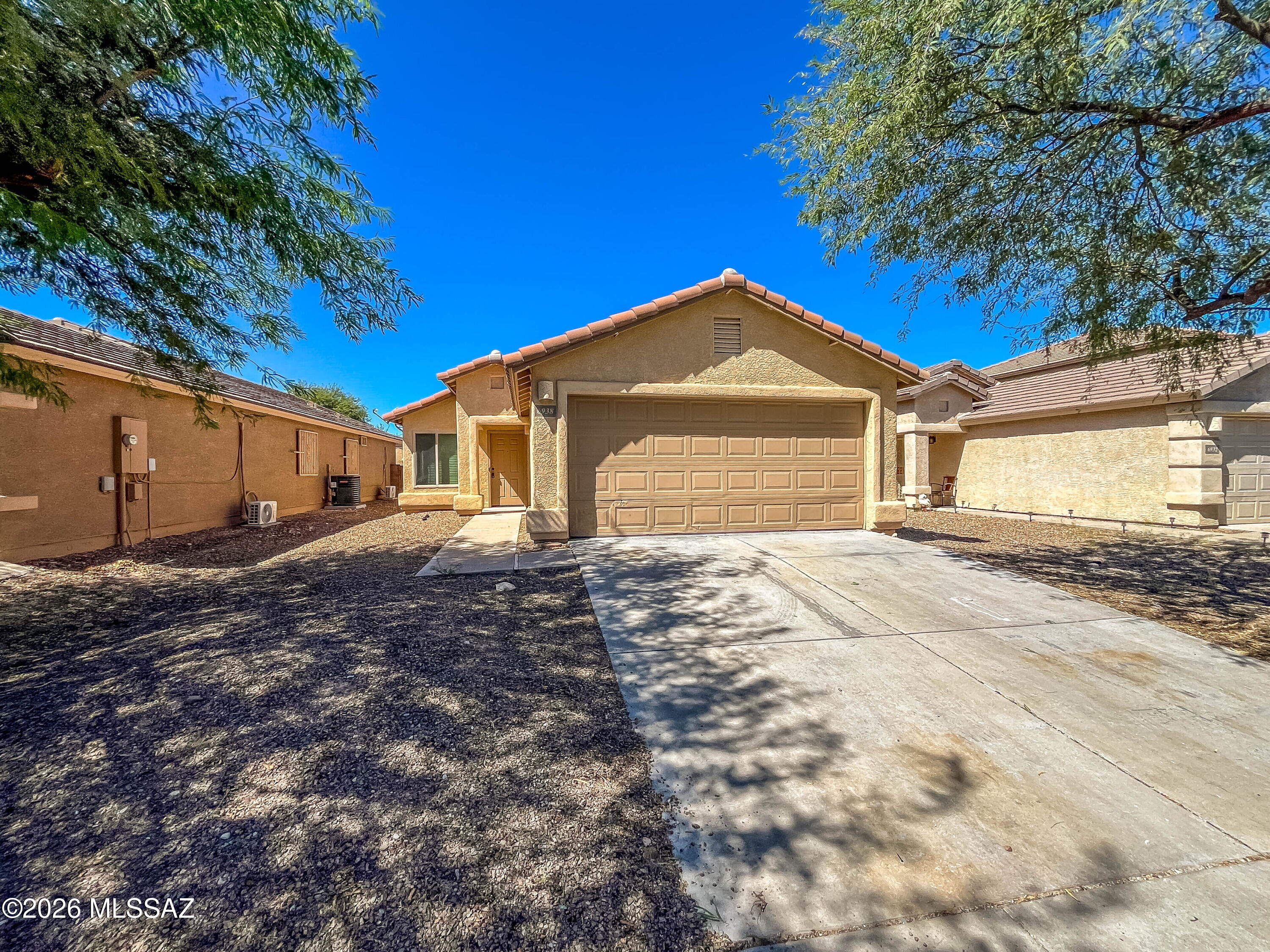 Updated 3-Bedroom Home with Tile Throughout, Two-Car Garage & Fenced Backyard

Enjoy comfortable living in this updated 3-bedroom, 2-bath home in Valencia Reserve South. Featuring 1,258 square feet, the home offers easy-care tile flooring throughout, fresh interior paint, updated lighting and stainless steel kitchen appliances.

A spacious great room provides room to relax and gather, while the kitchen includes a pantry for extra storage. Additional features include walk-in closets, air conditioning, a separate laundry room and an attached two-car garage.

Outside, enjoy a fenced backyard and covered patio--an inviting space for outdoor dining or unwinding at the end of the day. The southeast Tucson location offers convenient access to I-10, Davis-Monthan Air Force Base and Raytheon.