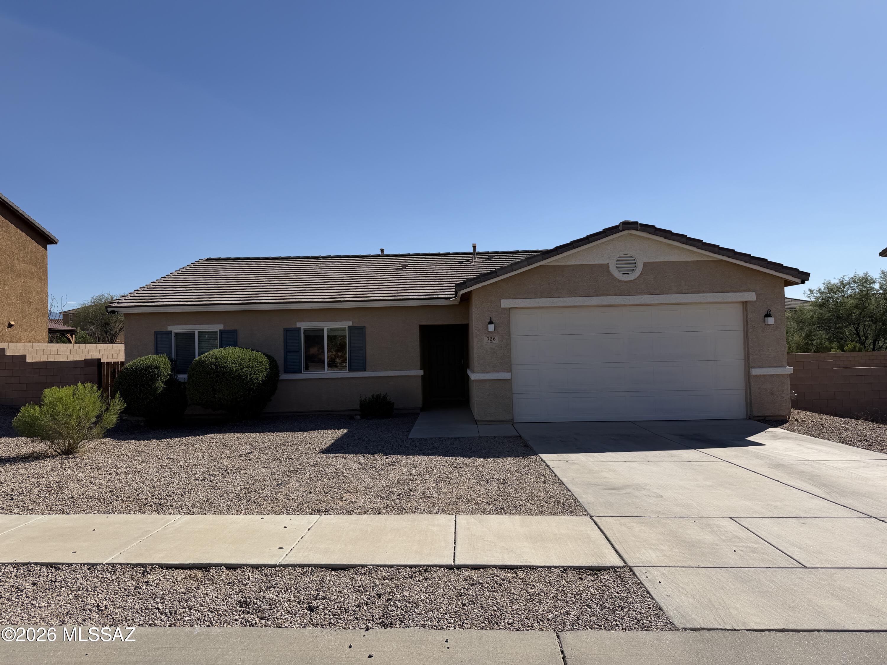 Wonderful 3 bedroom, 2 bath plus den rental, 1627 Sq Ft home. Open floor plan, quartz island with seating, gas range, all appliances included. Master suite with walk in closet and dual vanities. Beautiful tile and wood laminate floors throughout. Low care backyard with covered patio with fan, extended brick pavers, turf, built in planting beds and mountain views! Located in The Award-Winning Vail School District.