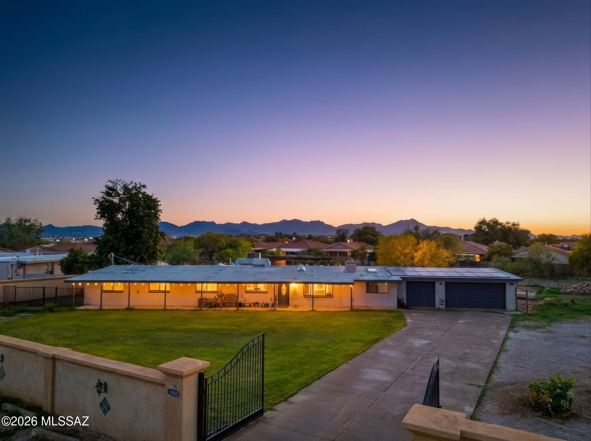Perfectly situated horse property in a prime Tucson location near shopping. This extensively renovated home features a new kitchen, a movie theater, a water softener, and completely remodeled bathrooms with new PEX and electrical service. The outdoor oasis features a large pool with new plumbing/pumps, a basketball court, fresh grass, fruit trees, and new fencing. Includes a dog run with a pet door. Massive upgrades include full solar with battery backup! 3-Car garage with RV parking. The versatile land offers potential to divide and build or keep for horses. An impressive, efficient home ready for a new family.