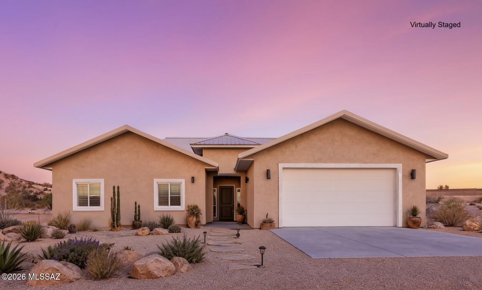 Welcome to this stunning new construction home by Mc2 Homes, perfectly situated on 3.88 acres of picturesque desert landscape with breathtaking mountain views! Built with durability and longevity in mind, this steel-framed home features a metal roof and offers 1,675 sq. ft. of thoughtfully designed living space, including 3 bedrooms and 2 bathrooms.

Step inside to discover a bright, open-concept floor plan that seamlessly blends modern style with everyday functionality. The beautifully appointed kitchen features sleek finishes, soft-close cabinetry, generous counter space, and plenty of room for entertaining. The spacious primary suite offers a relaxing retreat, complete with a walk-in shower and an oversized walk-in closet featuring custom built-ins. An extended 2-car garage provides a additional space for vehicles, storage, and all your outdoor essentials.

The possibilities are endless with 3.88 acres to make your own! Whether you envision a horse property, a detached workshop, additional outbuildings, or simply enjoying the wide-open spaces, this property offers incredible potential.

Enjoy the charm and tranquility of small-town living without sacrificing convenience! With easy access to I-10, commuting to Tucson or Sierra Vista is a breeze. Nearby shopping, dining, everyday amenities, and a highly regarded school district add to the appeal of this exceptional location.

Experience the perfect combination of modern construction, country living, and endless possibilities--all surrounded by the natural beauty of Southern Arizona!