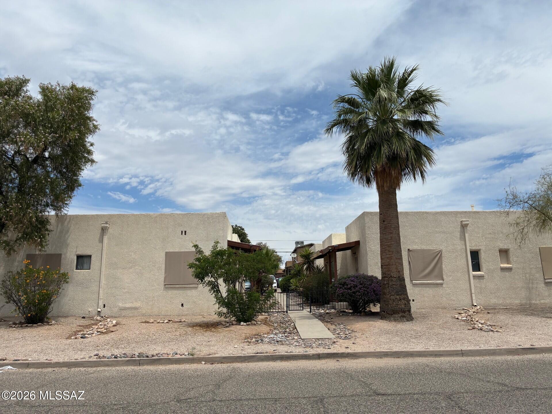 4 Units close to U of A, 2/2bedrooms, 2/4bedrooms. These units are move-in ready, very little deferred maintenance. Unit 903 (Southwest unit) is vacant, rent is projected to be $2,000 per Mo. Unit 905 is $1,100 per mo. leased thru 11/26. Unit 909 is $2,000 per
mo. leased thru 7/27. Unit 911 is $1,300 per mo. leased thru 7/27. Per owner the
Effective Built date should be 2004 when all units were remodeled. Street parking
permits are available thru the City, plenty of parking in the rear. Parcel 123-15-0780 is included with this sale. One owner is a licensed Realtor in AZ.