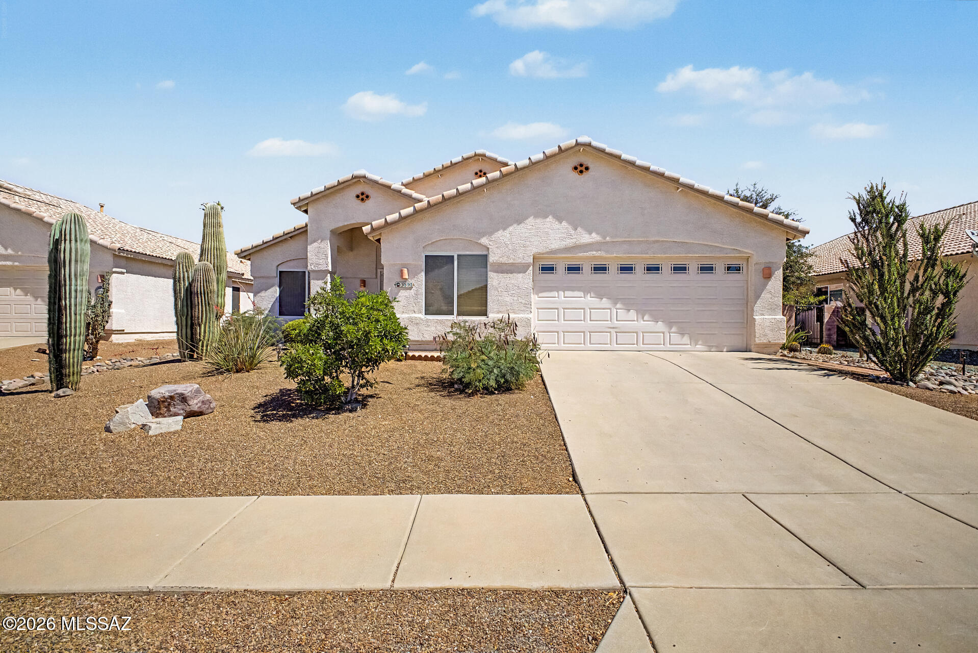 Charming home in North Star Estates awaits you! Offering 3 beds + bonus room, 2 baths, desert landscape, & a 2-car garage w/cabinets. The inviting interior showcases vaulted ceilings, tons of natural light, designer palette, and tile & wood-look flooring t/out. Great floor plan with a large formal living & dining room, alongside an open-concept family room w/built-in wall cabinetry. The kitchen boasts SS appliances, ample wood cabinetry, recessed lighting, and a 2-tier peninsula. Cozy breakfast nook w/bay window! Double door main bedroom has an ensuite with dual sinks, jetted tub, separate shower, & a walk-in closet. PLUS! There is a bonus room that can be an office or extra bedroom. Enjoy relaxing in the Arizona room! The backyard also provides ample space for gatherings. Welcome home!