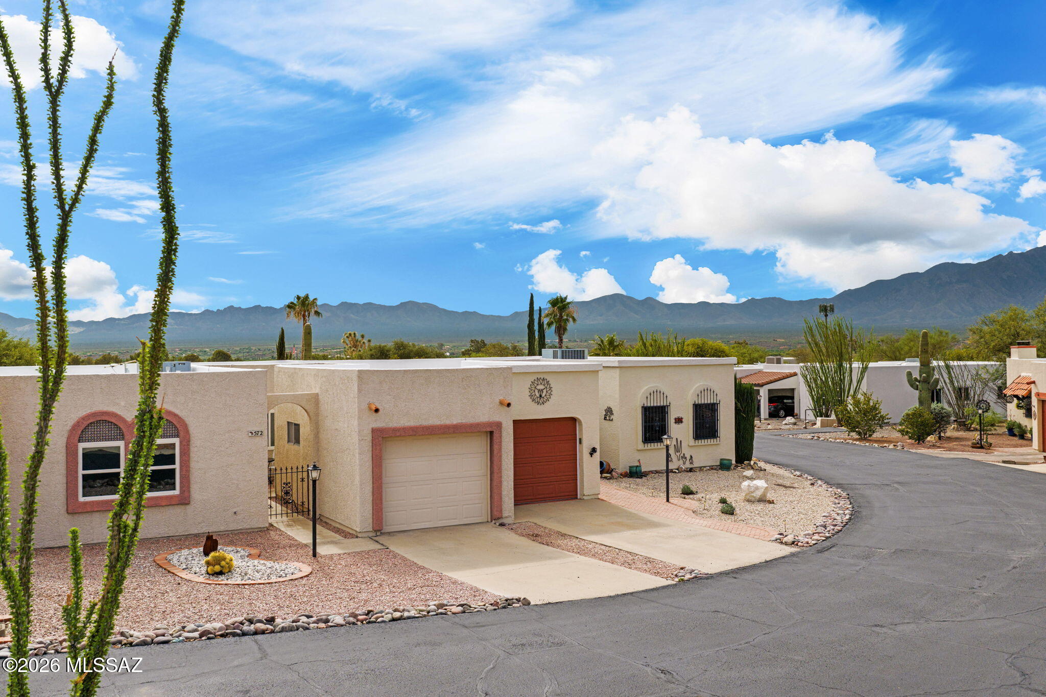 Range Priced-Seller will accept/or counter offers b/w $239,000 & $249,000. Enjoy breathtaking views of the Santa Catalina Mountains and unforgettable Arizona sunsets from this beautifully updated townhome. The spacious layout features large bedrooms, updated bathrooms, and a modern kitchen with new cabinetry & counters, custom backsplash, breakfast bar, and newer appliances. The inviting living spaces flow seamlessly to the outdoors, where the backyard patio & extra screened-in patio create perfect spots for relaxing or entertaining against a stunning mountain backdrop. Additional outdoor storage rooms provide space & convenience for your bicycles, hobby items & knick-knacks! Furniture, Kitchenware & Everything else included with the right offer. Just bring your clothes & Move Right In!! Green Valley, Arizona, located just 20 miles south of Tucson, is renowned as a premier, active adult retirement community. It borders the Santa Rita Mountains, making it a world-famous hotspot for hiking and birding (especially in Madera Canyon).

Green Valley is anchored by Green Valley Recreation (GVR) which grants residents access to 13 modern, recreation facilities. Members enjoy access to 13 heated swimming pools, 6 state-of-the-art fitness centers, tennis and pickleball courts, and more than 10 specialized hobby and arts studios.