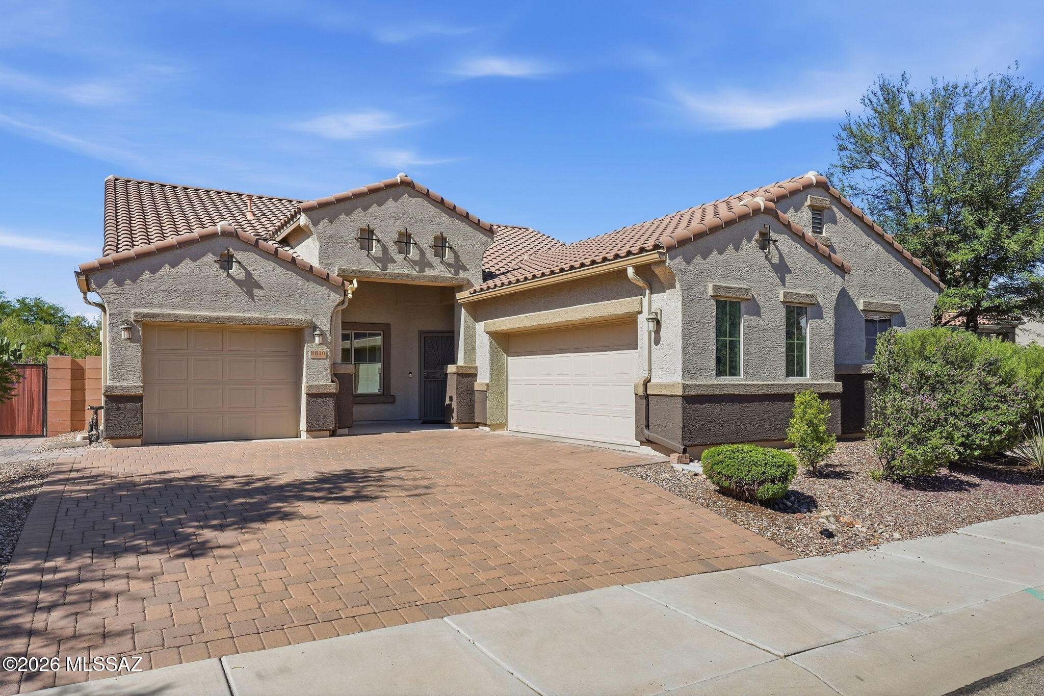 Motivated Seller...Experience refined desert living in this beautifully appointed 3-bedroom, 2-bath residence in desirable Saguaro Bloom. An inviting open-concept design creates effortless flow between the living, dining, and kitchen spaces, ideal for both entertaining and everyday living. The spacious kitchen offers abundant cabinetry and generous storage, while a versatile office/den provides an elegant workspace or private retreat. A spacious 3-car garage adds exceptional convenience and storage. Step outside to a beautifully landscaped backyard designed for peaceful relaxation and outdoor enjoyment. A distinguished home offering comfort, style, and the elevated Saguaro Bloom lifestyle.