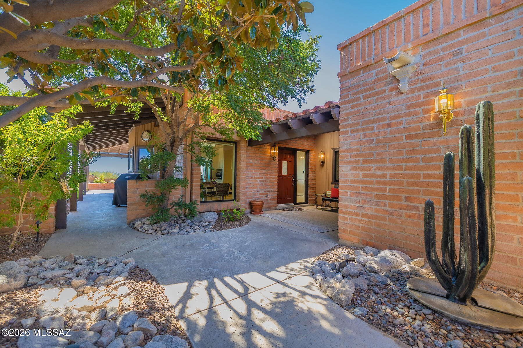 This is the one! Magnificent city and mountain views from this ridge top beauty in Fairfield in the Foothills. You will love the wall of glass overlooking the back patio and stunning views. This home has been completely remodeled from the raised ceilings, concrete floors throughout, opened kitchen with custom cabinets, upgraded skylights, epoxy floor in garage. Primary bathroom updated with large walk-in closet. Enter through the  lush courtyard and find a one of a kind magnolia tree, stone cactus fountain and professional landscaping & lighting.  Whole house water filter/softener. HVAC new in 2025. Windows and sliding doors new in 2019. Enjoy walking trails, community clubhouse, pools, spas, tennis/pickleball, and bocce ball.