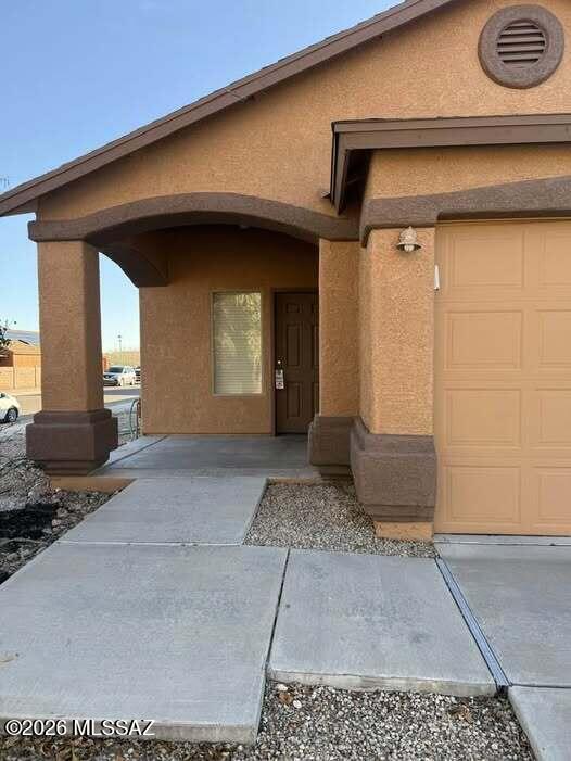 COMING SOON! Charming 2 Bedroom, 2 Bath, 2 Car Garage townhome with cathedral ceilings on private corner lot with large enclosed backyard. *Seller in the process selecting new flooring and paint but will give a credit to buyer for buyers choice.
