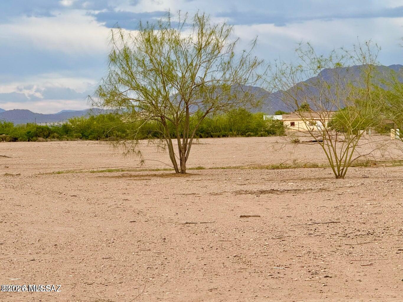 Hard to find lot in the neighborhood of Eloy North has city utilities and services available for your new build new including: water, power, sewer, phone, and gas. With nothing but open space behind you, this lot has views, and tons of privacy very few properties can provide. Come see it for yourself