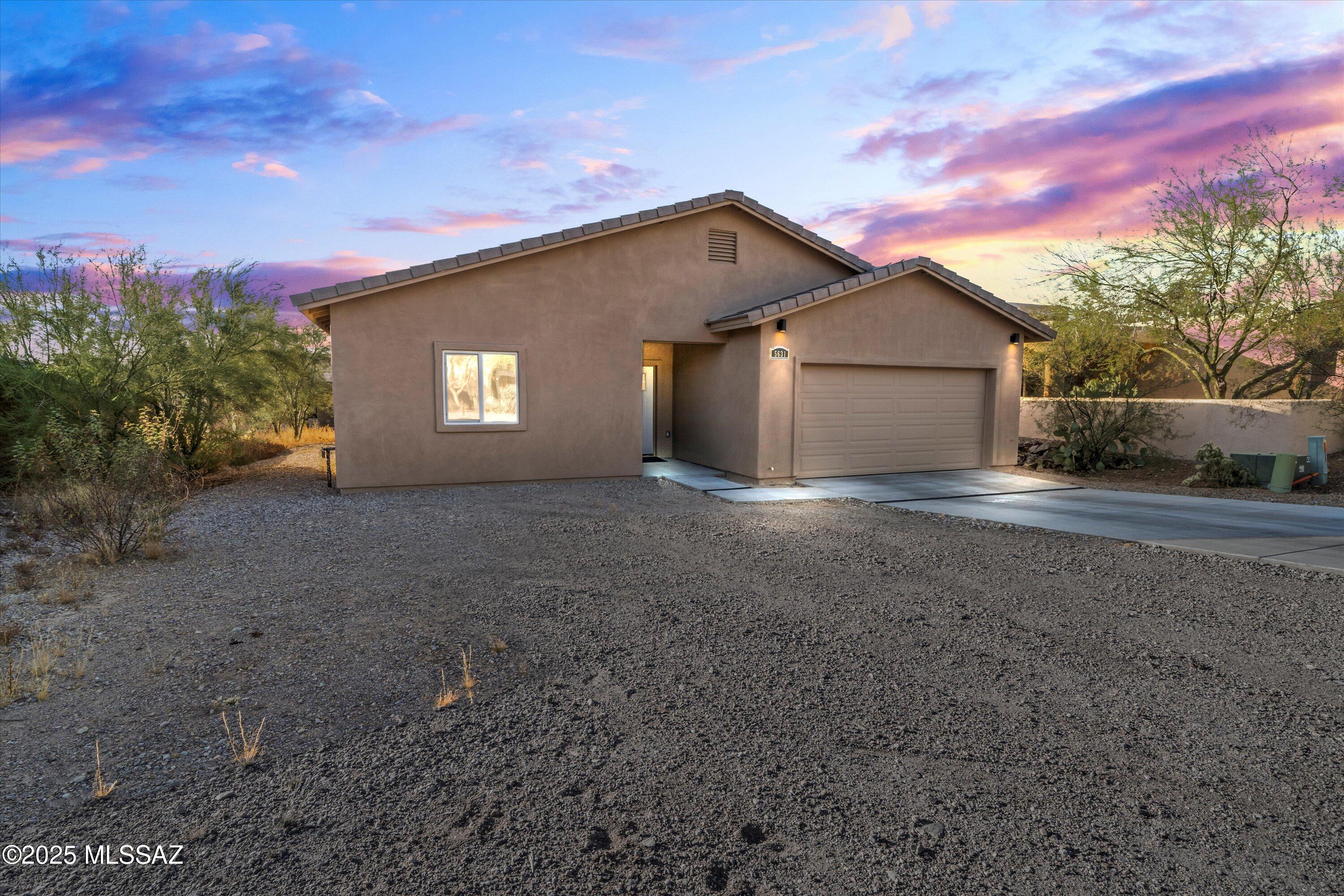Previously appraised for $440k!  See the new, modern, spacious home in the community just South of the Tucson Mountains!  With one-of-a-kind views right from the front door, this home has easy access to walking trails and a short walk to the community center.  Be the first owner of the home and make the front yard your own, while enjoying the modern interior.  Community amenities include a pool, spa, pickleball court, tennis, and more.   Only minutes from Old Tucson, Starr Pass, Saguaro National Park, and Casino Del Sol.