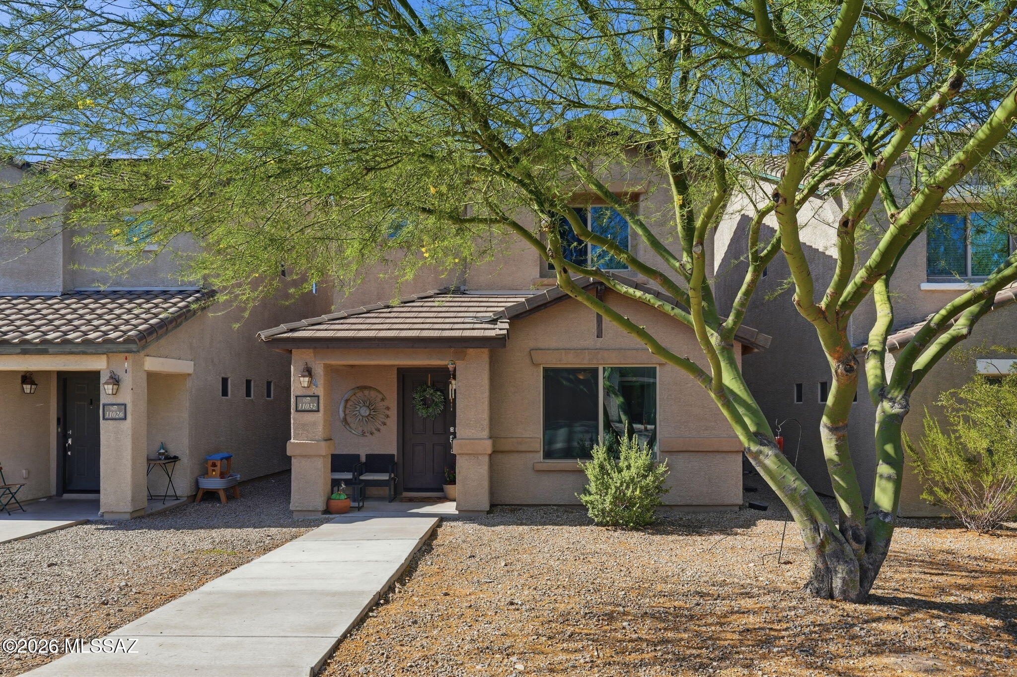 VA Assumable for qualified buyers. Beautiful home in the sought after Sierra Morado community. Prime location near shopping, Davis-Monthan AFB, and major employers. The open-concept kitchen, dining, and living areas feel bright and spacious, with excellent flow for everyday living and entertaining. Enjoy abundant storage throughout and a low maintenance lifestyle, HOA maintained grounds with no enclosed yard to upkeep. This well cared for 3 bed, 2.5 bath home is move in ready and thoughtfully maintained. Community perks and convenient access make this a standout value. Discover comfort, convenience, and quality in Sierra Morado.
