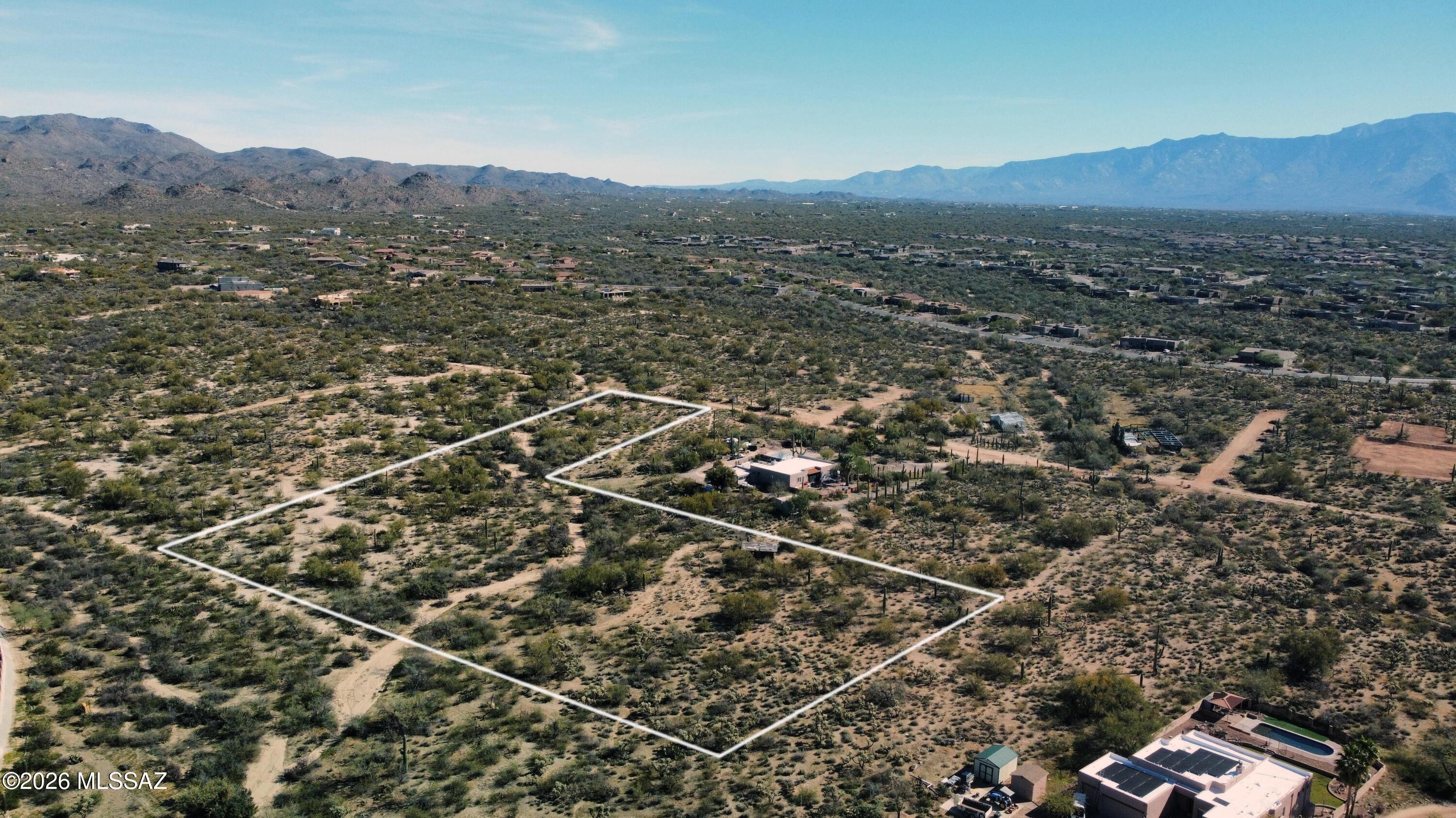 5-acre parcel with amazing building site options on Tucson's extended NW side. Zone R-144, giving you the flexibility to build your home and amenities that suit your lifestyle. This parcel is a part of a 10-acre parcel that is in the process of being split. Member owned water company with one well connection, Trico electric and septic required.  Property lines have been staked for easy identification.