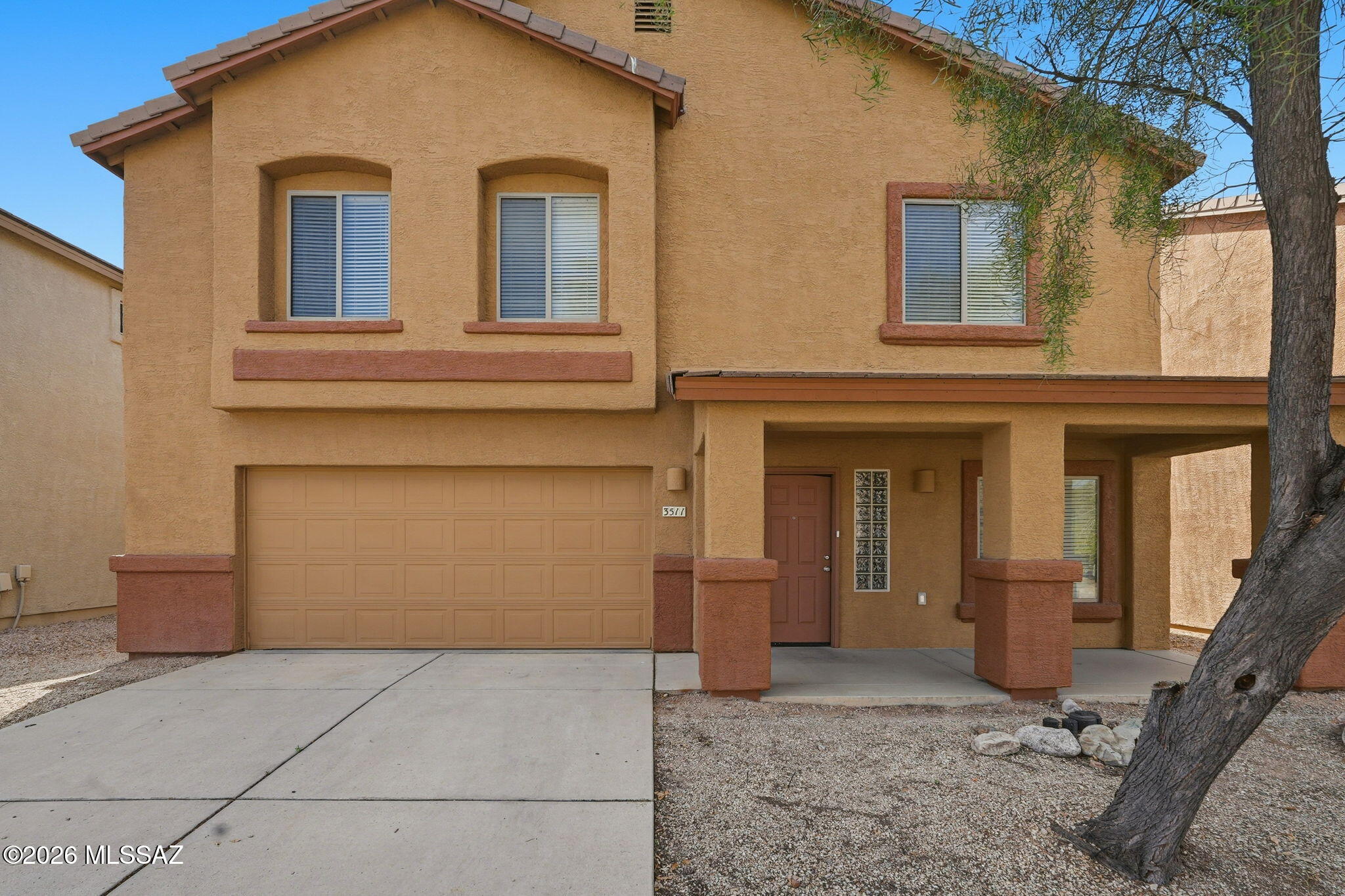 Beautiful DR Horton home in the conveniently located Northwest community of Cortaro Crossing. This spacious floor plan features 4 bedrooms, 2 baths, plus a versatile loft. Welcoming living and family rooms create flexible spaces for everyday living and entertaining. The bright kitchen offers upgraded white cabinetry, ample counter space, a breakfast bar, and stainless steel appliances, opening to the main living area. Neutral finishes and easy-care flooring add to the move-in-ready appeal. The primary suite includes a dual-sink vanity, walk-in shower, and generous closet space. Enjoy the backyard with a covered patio and extended pavers—perfect for relaxing or entertaining. Close to shopping and dining.