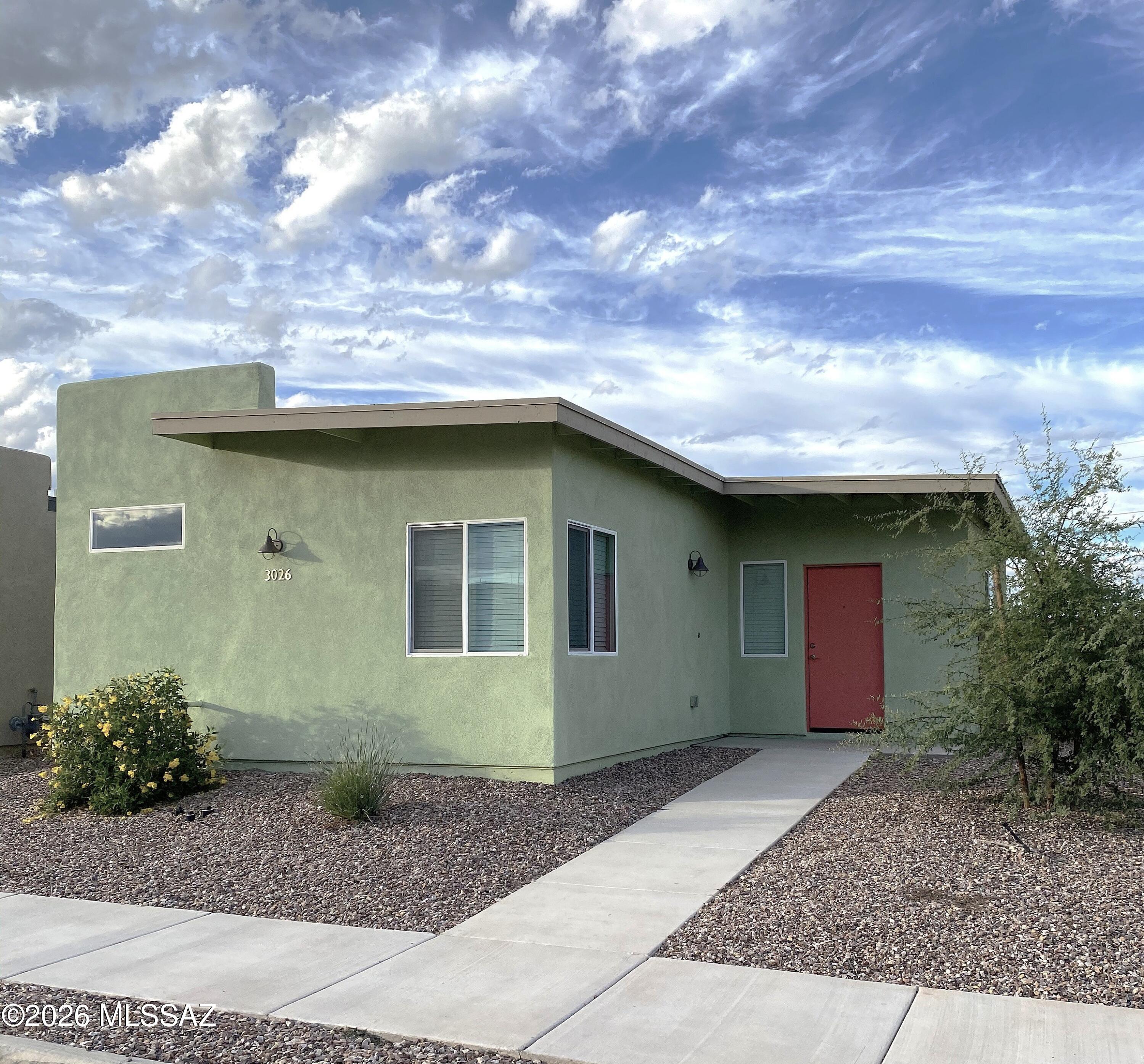 Modern 2BR/2BA home in desirable Silverbell community. Built in 2018 by Pepper Viner Homes, this well-maintained 1,241 sq. ft. residence features an open floor plan, spacious great room, quartz countertops, espresso cabinetry, stainless steel appliances, large kitchen island, and ceramic tile flooring throughout. Both bathrooms feature custom-tiled walk-in showers. Washer and dryer included. Attached 2-car garage, private fenced side yard, low-maintenance landscaping, and energy-efficient construction. Convenient west-side location near Downtown Tucson, I-10, The Loop, shopping, dining, employment centers, and Sun Tran transit. Excellent condition. Available for immediate occupancy. One-year lease or longer. flexibility for guests, a home office, or roommate living. Full-size washer and dryer are included.
Enjoy low-maintenance desert landscaping, a private fenced side yard, and attractive modern architecture with mountain views nearby. Conveniently located minutes from Downtown Tucson, I-10, The Loop shared-use path, shopping, dining, and major employment centers. Convenient Sun Tran bus stop is located a short walk away. 
Features Include: 1,241 Sq. Ft. Bedrooms " 2 Full Bathrooms " Attached 2-Car Garage " Quartz Countertops " Stainless Steel Appliances " Ceramic Tile Flooring Throughout " Custom Tiled Showers " Washer & Dryer Included " Private Fenced Side yard " Low-Maintenance Landscaping " Built in 2018 by Pepper Viner Homes " Excellent Condition and Energy Efficient
Available for immediate occupancy. One-year lease or longer.