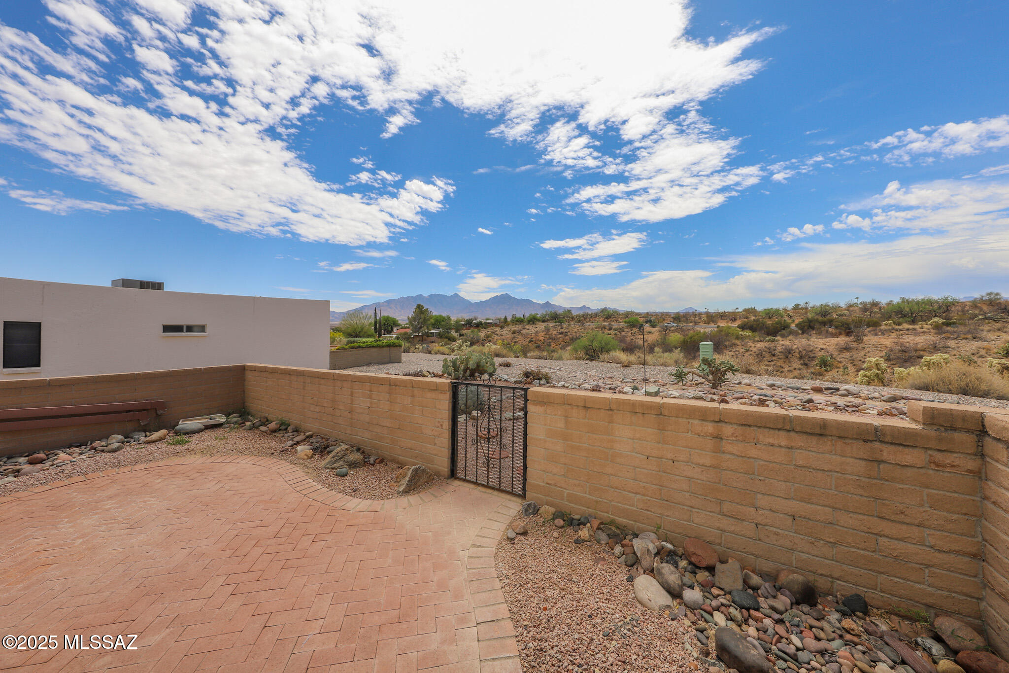 BEAUTIFUL MOUNTAIN VIEWS! This light-filled corner townhouse offers breathtaking mountain views and an expanded floor plan with a versatile den that can serve as a 3rd bedroom, office, or hobby room, a rare feature in similar models. Enjoy 2 spacious bedrooms, 2 full baths, and a dedicated interior storage room for added convenience. Perfect for seasonal or year-round living in this desirable 55+ community with Green Valley Recreation amenities and located near one of the larger recreation centers. Enjoy the views, extra space, and vibrant Green Valley lifestyle!