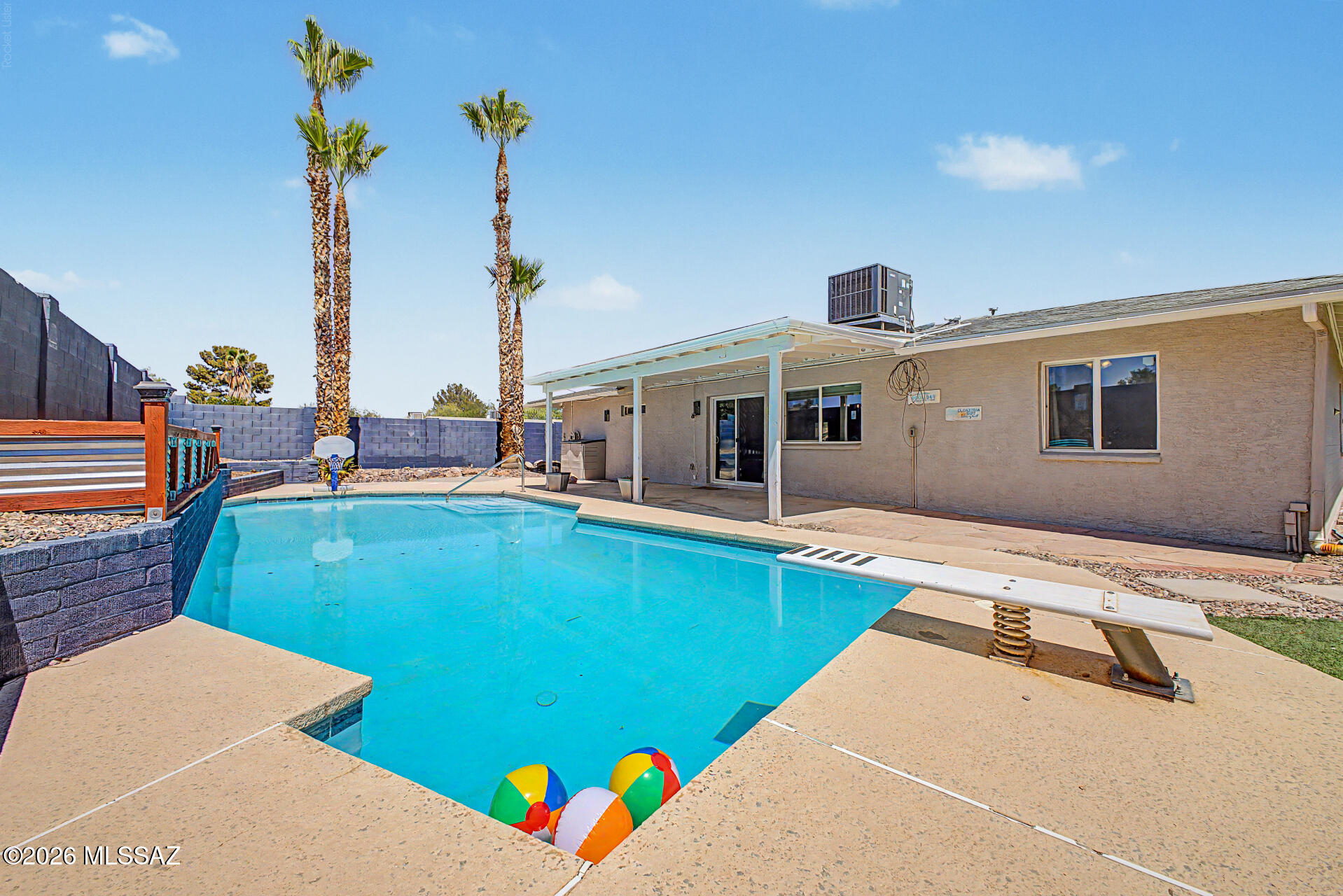 Welcome to Poolside Paradise on the East Side! 

Where every day feels like summer. Situated on a premium corner lot with beautiful mountain views from the front, this home welcomes you with an open, light-filled floor plan, stunning brick accent walls, and an inviting kitchen designed for gathering. The remodeled primary bath, spacious layout, and thoughtful design create the perfect blend of comfort and privacy. Step outside to your private backyard oasis featuring a sparkling pool, lush turf, and an extended covered patio with misters, perfect for relaxing or entertaining all season long. Don't let summer pass you by without making this East Side gem your own!

Roof 5yrs.old. Heating and Cooling 2yrs.old.