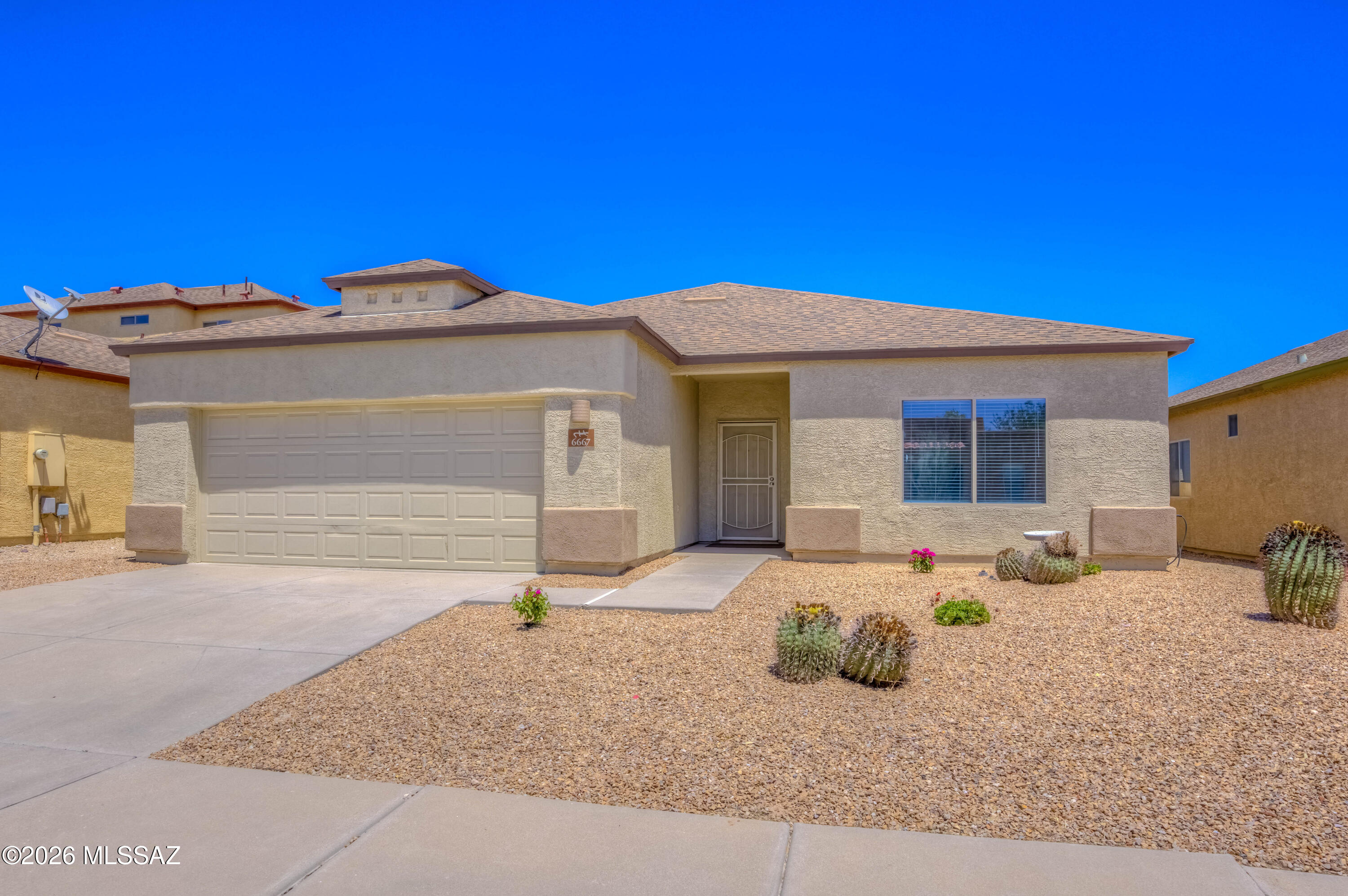 Beautifully Updated Home With Natural Desert & Mountain Views! This inviting home features a spacious Family Room, separate Dining Area, attractive wood-style flooring, updated fixtures thru-out, 2 inch window blinds & finished garage with coated floors. The bright & open Kitchen offers light cabinetry, stylish counters, shelved pantry, and all new stainless steel appliances. Large rear-facing windows showcase beautiful views of the natural desert, adding privacy and a peaceful backdrop to the home. The Primary Suite includes an executive height dual sink vanity, along with a roomy walk-in closet. Enjoy the covered patio and backyard, both perfectly positioned to take in the surrounding desert & mountain views. Convenient location with easy access to I-10. Don't miss this one! Owner/Agent