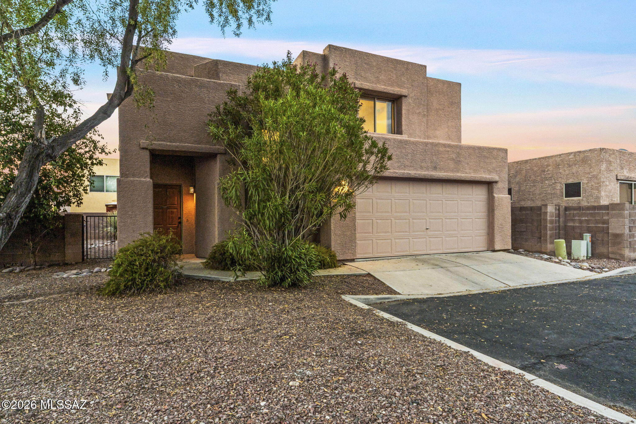 Don't wait on this Desirable North-Central Tucson opportunity! Tucked away in a cozy community located Near entertainment, restaurants, medical & amenities-Rillito River Park & the Chuck Huckleberry Loop. This lovely move-in ready 3 bedroom, 2.5 bath plus Loft home features updated mechanicals, new roof coating with 2 year transferable warranty, fresh interior paint, new flooring throughout, newer quartz kitchen countertops, stainless appliance package, and beautiful Mountain Views! Spacious bedrooms, loaded with storage & Private 2 car garage. Perfect low maintenance backyard. Call today!