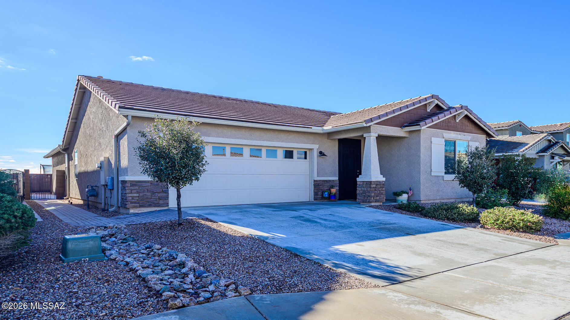 Step in and appreciate this, built in 2021, 4-bedroom, 2.5-bath home in the Master Planned Saguaro Trails community on Tucson's desirable Upper Southeast side in the sought after Vail School District!!!! This home offers a bright great-room design with dining area and surround sound prewire. The kitchen features quartz countertops, stainless steel appliances, upgraded cabinetry with crown molding, walk-in pantry, and a large island with breakfast bar and pendant lighting. The primary suite includes dual-vanity quartz bathroom counters, separate tub and shower, and a walk-in closet. Hall bath offers dual quartz vanities with tub-shower combo. Enjoy a covered patio and landscaped backyard with artificial turf, pavers, and desert plants, plus no rear neighbors!! CAN CLOSE QUICK!!! Front landscaping includes pavers, trees shrubs, and decorative gravel. Utilize the spacious 2-car garage with epoxy flooring and soft-water loop installed. HOA amenities include a pool, splash pad, clubhouse, parks, trails, ball field, and dog park. Convenient to shopping, dining, hospitals, Raytheon, Davis-Monthan AFB, and Fantasy Island bike trails.