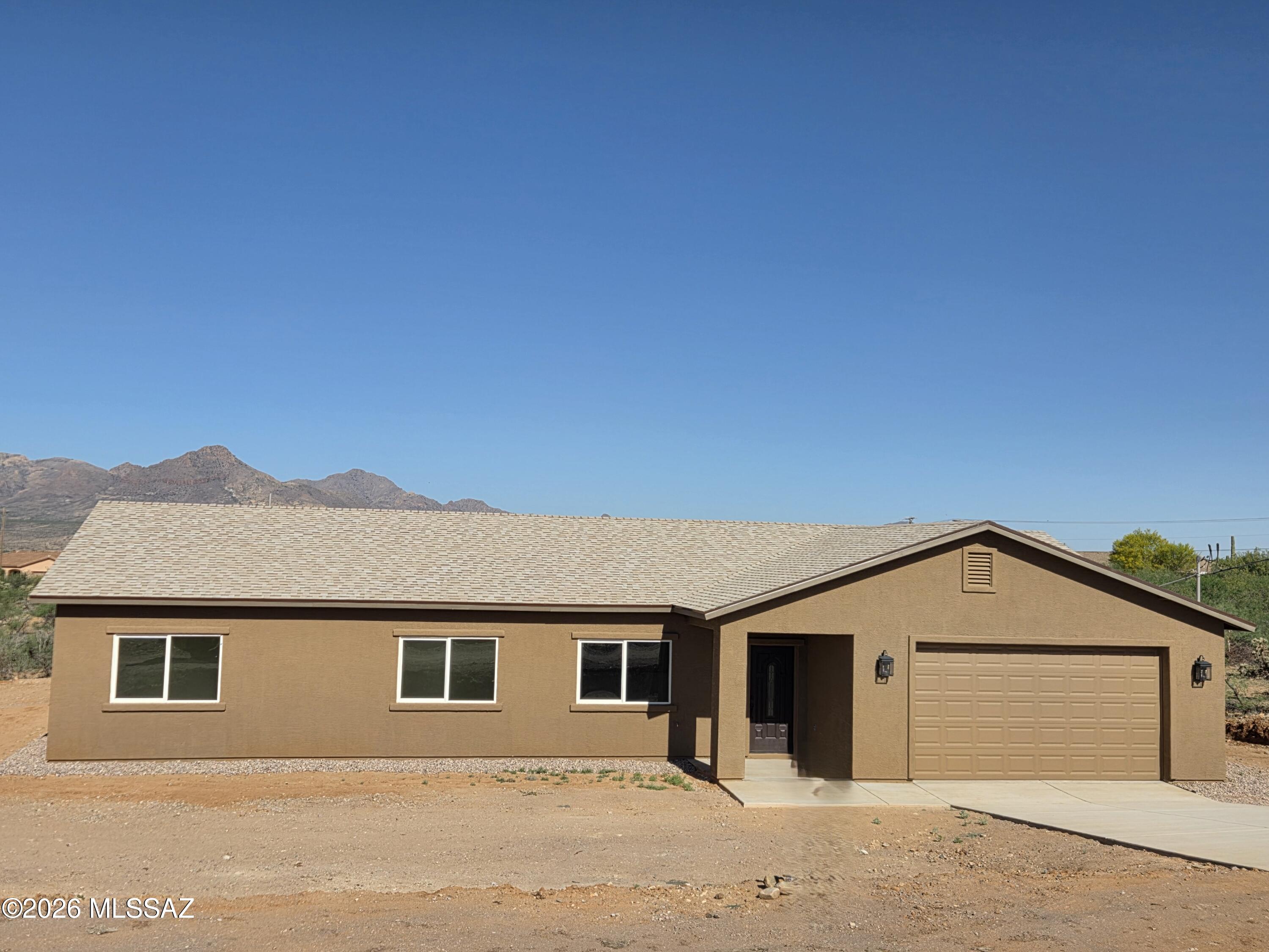 Numerous modern finishes:
Seller will consider offers  from $298,000 up and buy down interest rate, up to 3 points in buyer's favor at full price, plus concessions.
2422sf Under roof, oversize garage 555sf (22.7 X 22.9 feet), Beautiful kitchen with lots of cabinet space, staggered kitchen cabinets, crown molding, builder's walk-in pantry, granite countertops in kitch and baths, large laundry room lots of cabinets and storage, large master bedroom, double sinks in master bath, walk-in curbless shower, huge yard. Plumbed for water softer, charger in garage for car, ceiling fans in all bedrooms, 9ft ceilings, overheight garage door.
