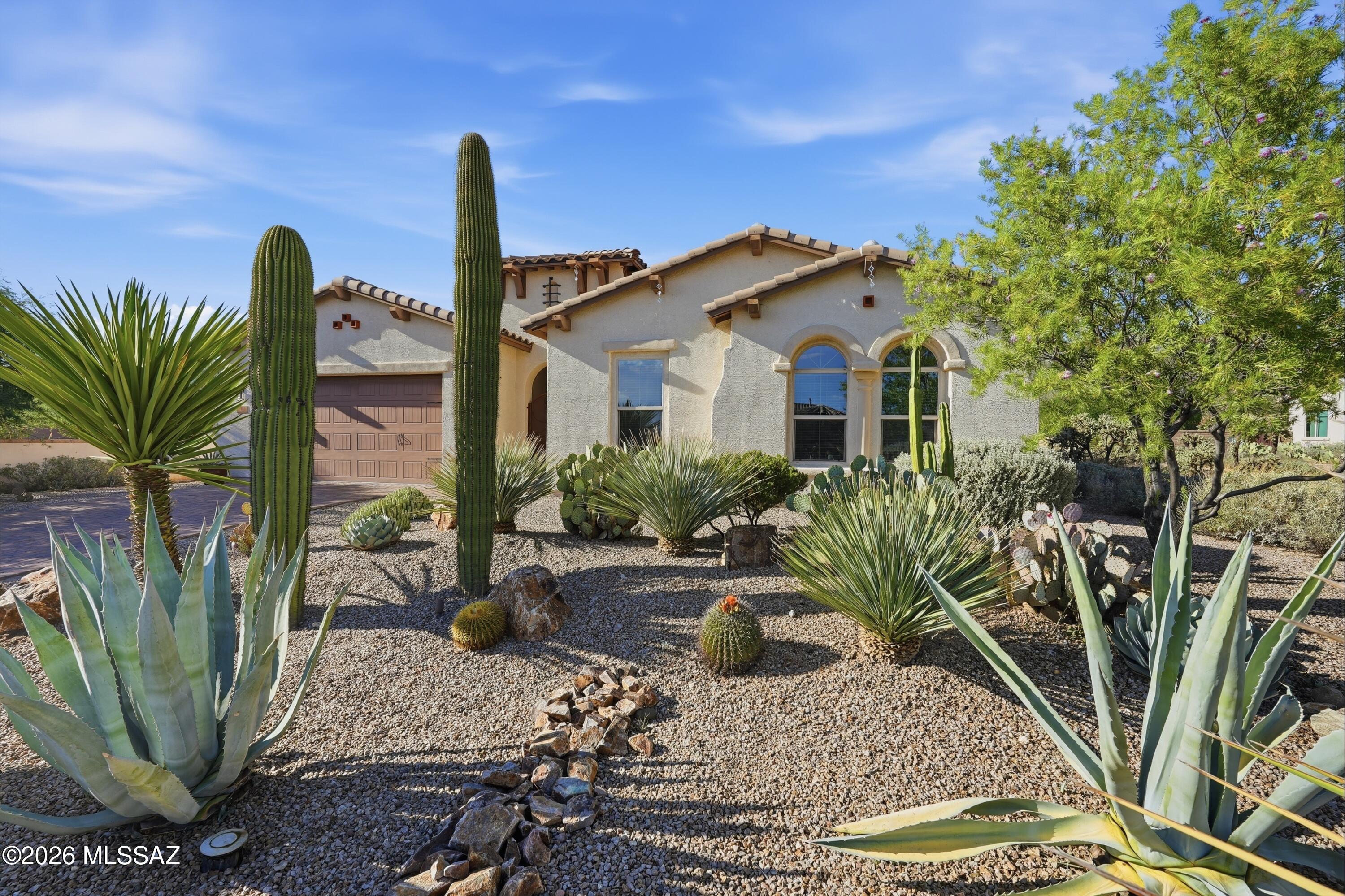 Nestled in the breathtaking foothills near Arizona National Golf Club, this stunning residence offers more than a home; it offers a way of life. Here, mornings begin with the soft glow of the sun rising over the Catalina Mountains and evenings end with spectacular desert sunsets painted across the sky.

Designed for those who love both relaxation and entertaining, the backyard feels like a private resort. Imagine spending warm Arizona afternoons floating in the sparkling pool, enjoying cocktails at the swim-up bar, and gathering friends and family around the outdoor kitchen for dinner under the stars. Whether hosting a celebration or enjoying a quiet evening at home, every corner of this outdoor oasis invites connection and unforgettable memories. Inside, the home embraces a seamless indoor-outdoor lifestyle. The expansive living spaces flow effortlessly into the heart of the home, where a well-appointed kitchen makes everything from casual breakfasts to holiday gatherings feel special. Large windows capture the beauty of the surrounding desert landscape, creating a constant connection to the views beyond.

When the day is done, the spacious primary suite becomes a private retreat, offering a peaceful space to unwind and recharge. The luxurious ensuite bath delivers a spa-like experience, while additional bedrooms provide flexible accommodations for family, guests, or a home office.

Located in one of Tucson's most sought-after eastside communities, just moments from Arizona National Golf Club, this exceptional property blends luxury, comfort, and the natural beauty of the Sonoran Desert. Here, every day feels like a vacation, and every sunset reminds you why you chose to call Tucson home.

9915 E. Goldsmith Place isn't just where you live. It's where Arizona living comes to life.