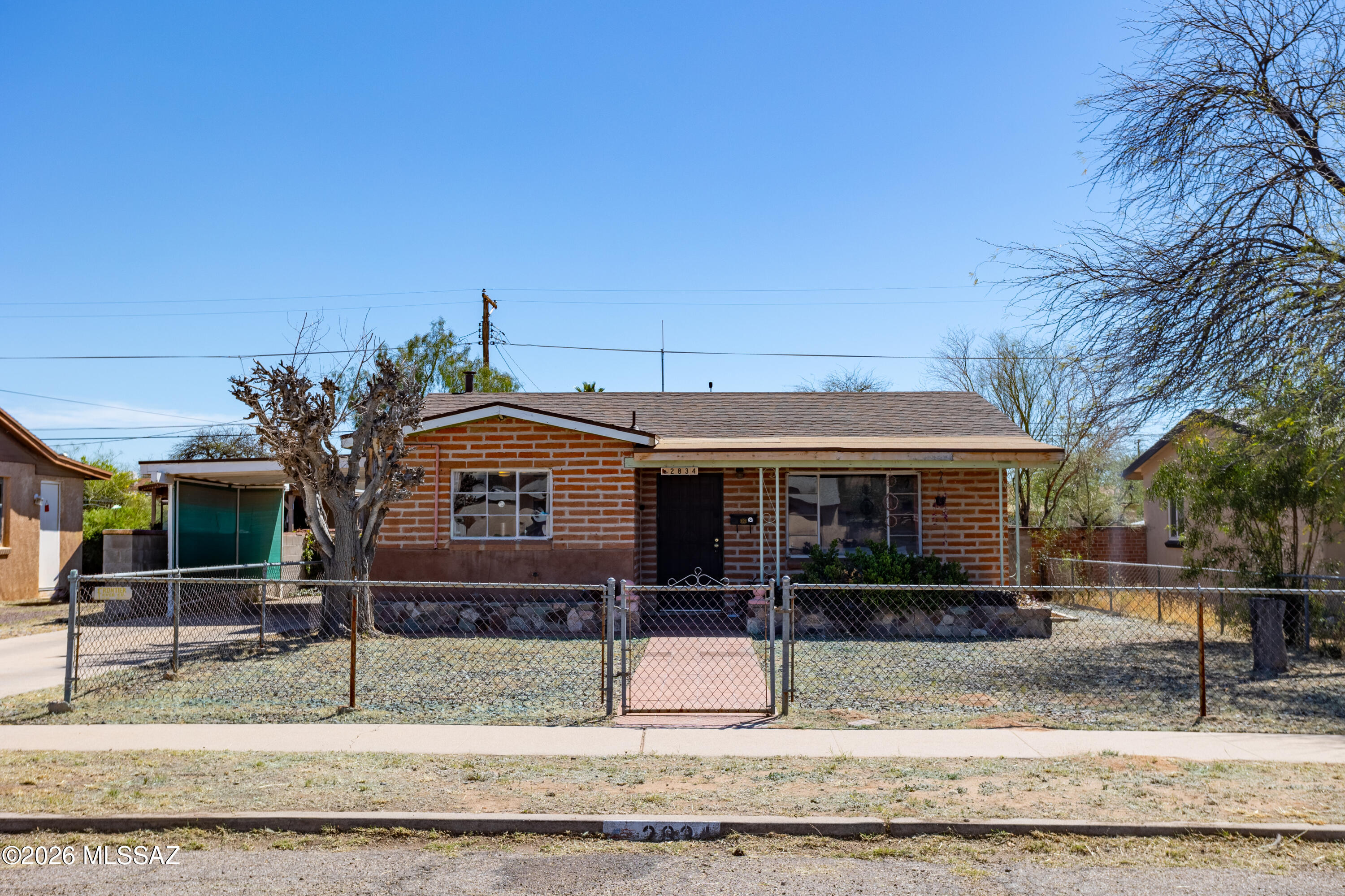 Lovely 2 bed, 1 full bath, 1 half bath brick home near Reid Park. Includes a rear Casita with one room and a bathroom/laundry. Investor special. Priced far under market value.