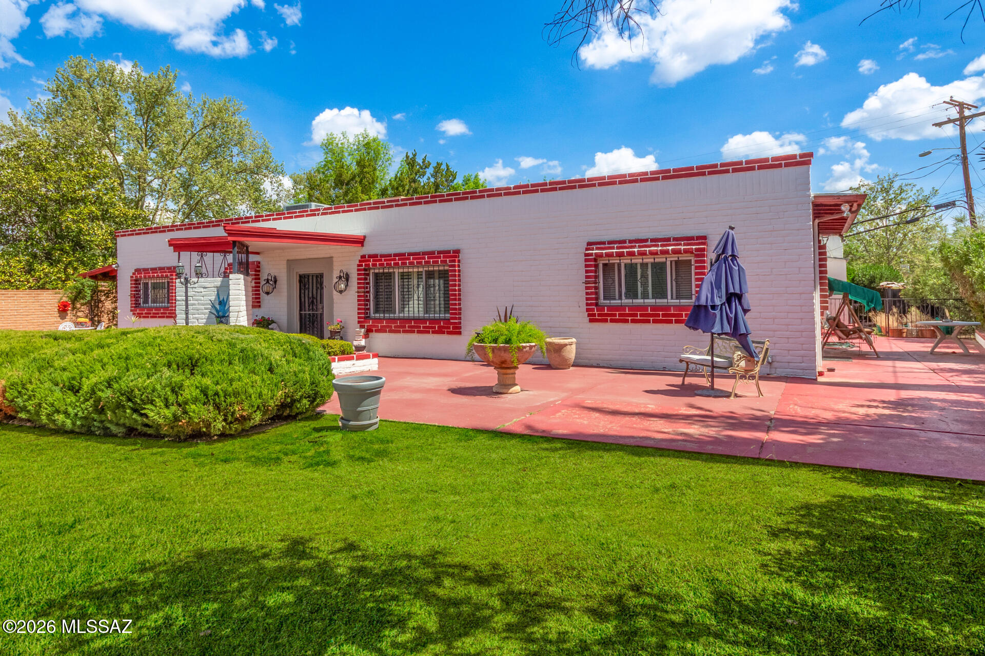 Welcome to this spacious and well-maintained 4-bedroom, 4-bath home offering 2,912 sq ft of living space on a generous 0.53-acre lot in Nogales. This beautifully designed floor plan features multiple living areas including a formal living room, dining room, and family room, providing plenty of space for comfortable living and entertaining. The recently updated kitchen includes stainless steel appliances and a gas cooktop, making it perfect for everyday cooking or hosting gatherings. The home offers a split-bedroom layout. One bedroom features its own private entrance and can easily serve as guest quarters or a mother-in-law suite. Outside, enjoy a private backyard with mature trees, decorative landscaping, and a charming patio with a rock waterfall--ideal for relaxing or entertaining family and friends. Additional features include RV parking, multiple carport spaces, and a gated entry that adds privacy and curb appeal. This property offers the perfect blend of space, comfort, and functionality in a peaceful residential setting.