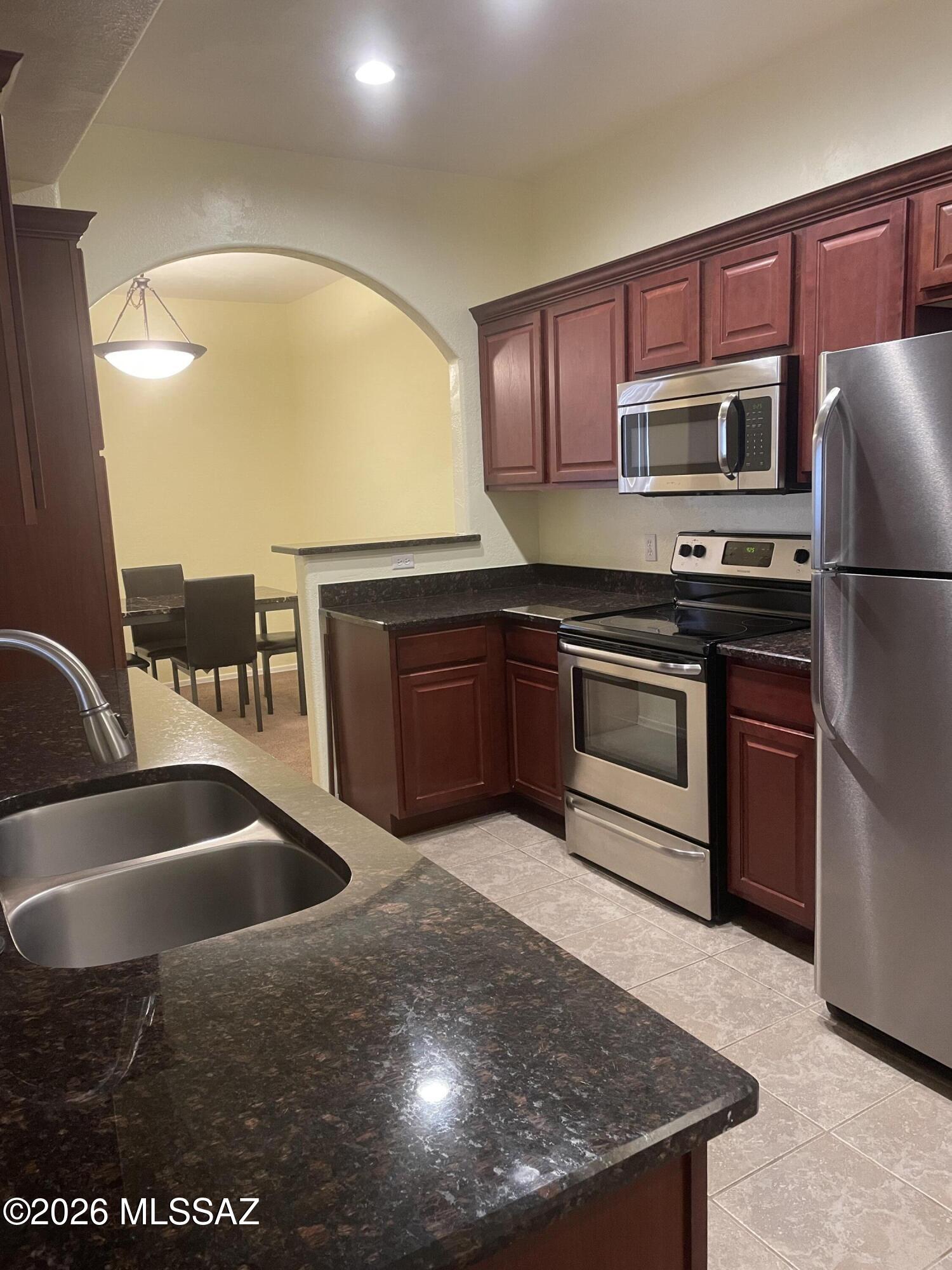 Gated Commuity. Resort-style condo with 2-bedroom, 2-bath. Featuring a split-bedroom floor plan for privacy. This semi-furnished condo includes an in-unit washer and dryer.
The spacious kitchen is well-equipped with a dishwasher, electric range, microwave, refrigerator, and ample pantry storage. A separate dining area and an extended covered patio with beautiful mountain views.
Community amenities include two pools, spa, gated access, and direct access to the Riverwalk, all just minutes from popular restaurants and Trader Joe's.
Water, sewer, and trash are included in the lease. Tenant is responsible for electricity, cable, and internet.
Minimum 1-year lease required. Move-in ready.