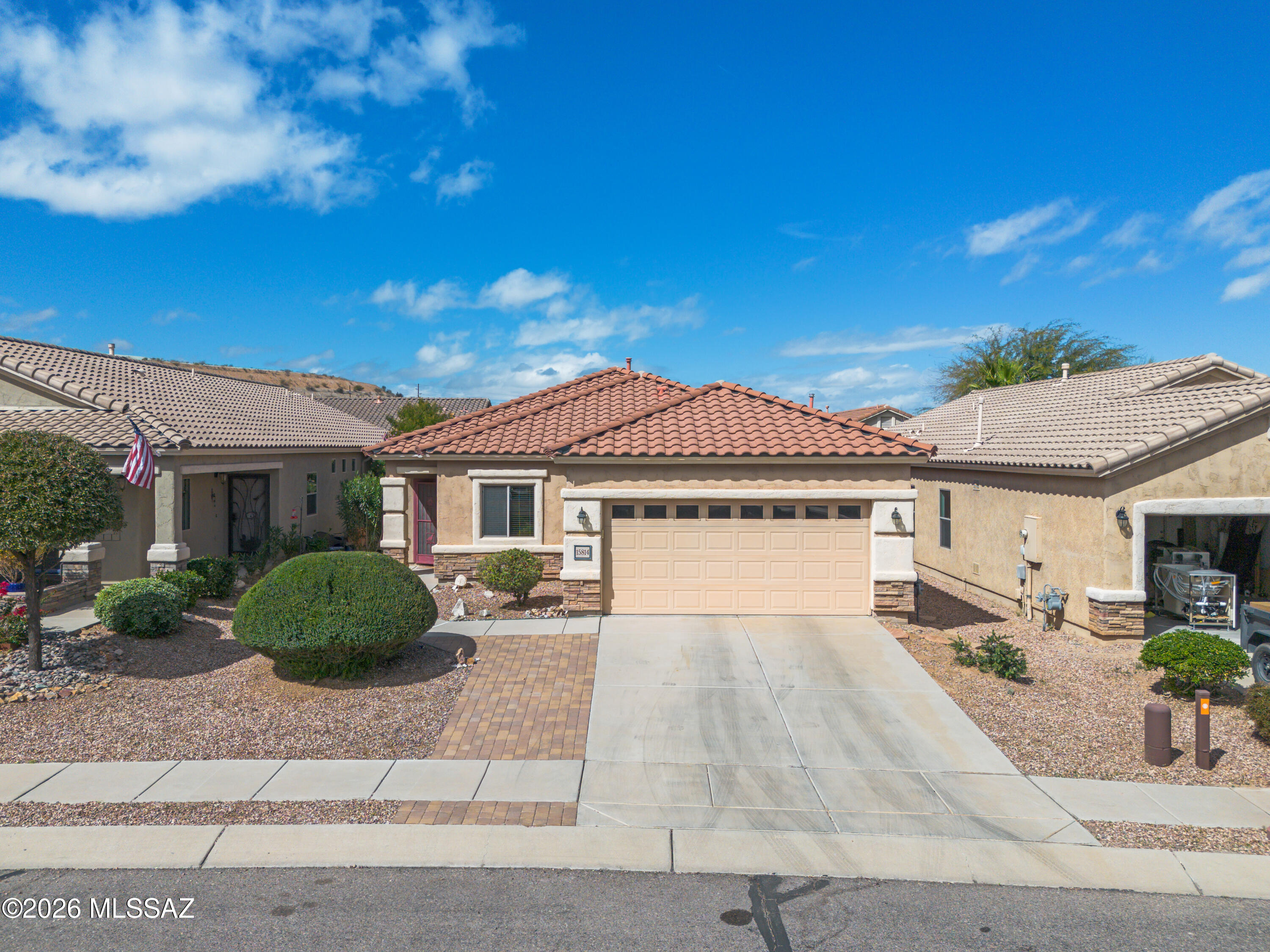 A charming single-level home in the award-winning 55+ Rancho Resort of Sahuarita. This home invites you to experience relaxed, active desert living just minutes from downtown Tucson. 1,594 square feet of thoughtfully arranged living space featuring two comfortable bedrooms, two full baths and a versatile bonus room ideal for a home office, hobby space or guest quarters. The bright, open kitchen centers around a convenient island and matching appliance set, creating a welcoming hub for meals or entertaining friends. The adjacent large dining area and living room adds spacious convenience. New Trane air-conditioning & furnace unit installed in November of 2024 with 8.5 years of warranty remaining that's transferable to the new owner. Large 2 car garage with lots of cabinets and storage space A charming single-level home in the award-winning 55+ Rancho Resort of Sahuarita. This home invites you to experience relaxed, active desert living just minutes from downtown Tucson. Meticulously maintained and lovingly cared for, the home offers 1,594 square feet of thoughtfully arranged living space featuring two comfortable bedrooms, two full baths and a versatile bonus room ideal for a home office, hobby space or guest quarters. The bright, open kitchen centers around a convenient island and matching appliance set, creating a welcoming hub for everyday meals or entertaining friends. The adjacent large dining area and living room adds spacious convenience. New Trane air-conditioning & furnace unit installed in November of 2024 with 8.5 years of warranty remaining that's transferable to the new owner.  Outside there is a fully fenced backyard, a private oasis perfect for pets, gardening or simply soaking in expansive desert skies. Large 2 car garage with lots of cabinets and storage space for tools or hobbies with a 2nd refrigerator/freezer.  A separate laundry room with washer, dryer and a handy utility sink. Living in Rancho Resort means access to resort-style amenities that make every day feel like a vacation: unwind in the pool and spa, stay active in the fitness center, walk the scenic paths, or play pickleball and tennis on well-maintained courts. Enjoy lively social opportunities with over 35 resident-run clubs and year-round events, plus indoor options such as a billiards room, library and tech center. Gated security offers peace of mind in a serene community setting while still keeping you close to shopping, dining and major transit via I-19. Whether you're downsizing, relocating, or seeking a welcoming, maintenance-light lifestyle with built-in social opportunities and start enjoying all Rancho Resort has to offer. Don't miss the chance to see this beautiful, well-appointed property in person -- it's more than a house, it's a lifestyle waiting for you. Old Republic Home Warranty will be included for buyer(s).