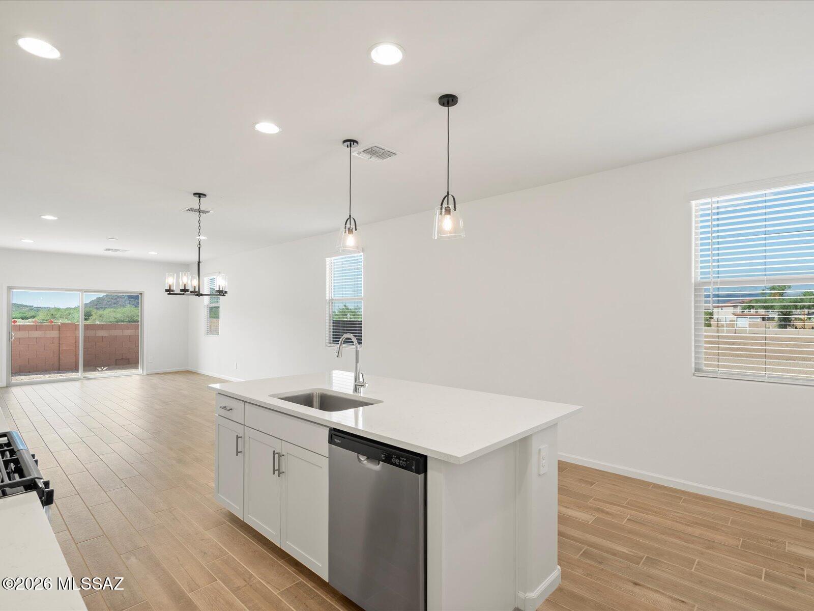 This spacious floorplan features an open-concept design with 4 bedrooms and 3 bathrooms, perfect for comfortable living and entertaining. Relax in the private primary suite, complete with an oversized walk-in closet, while the kitchen offers added convenience with a walk-in pantry for extra storage.
Now selling in Summerstone in Marana, Arizona, this community is ideally located near the Continental Ranch area with easy access to both Marana and Northwest Tucson via I-10. Enjoy nearby outdoor recreation at Saguaro National Park, El Rio Preserve, and the Summerstone community park. Move-in ready and includes a washer, dryer, refrigerator, and whole-home blinds!
