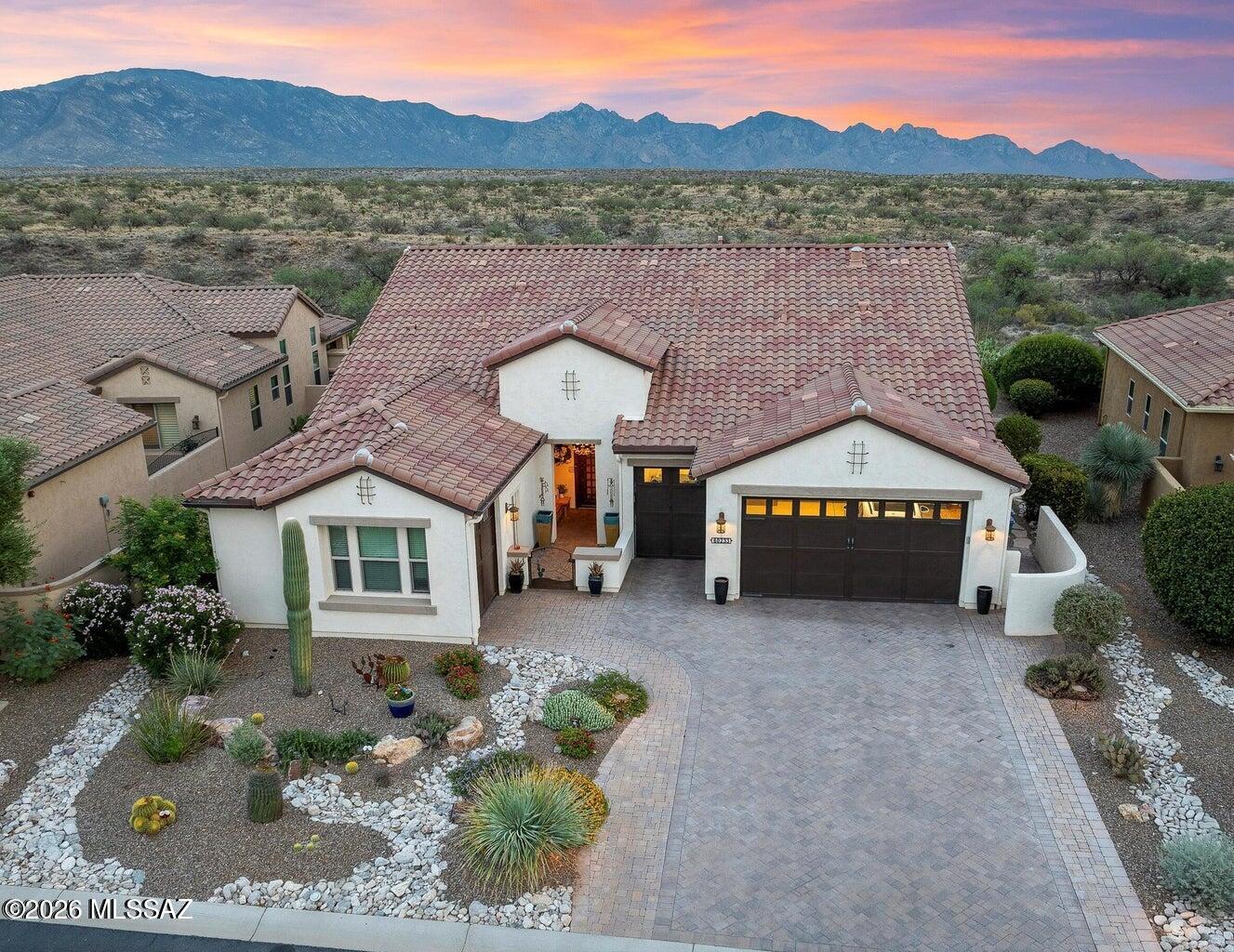 This furnished home is available to rent May 1st, 2026 onwards. Golf cart included! All utilities and community amenities included in the rent price. 3 month lease minimum. 1 dog considered. Enjoy breathtaking panoramic mountain views from your extended travertine patio, perfect for outdoor entertaining. This highly upgraded Pima model has a special casita hobby room that makes a wonderful retreat & hobbyist's dream! The gourmet kitchen features a sleek induction cooktop, full tile backsplash, dual roll-out base cabinets, a lazy Susan, Edison pendant lighting, solar tube, & a spacious walk-in pantry. 3rd full garage bay/casita and hot tub will not be available to Tenant. Home does not have cable TV, only internet/wifi for streaming.