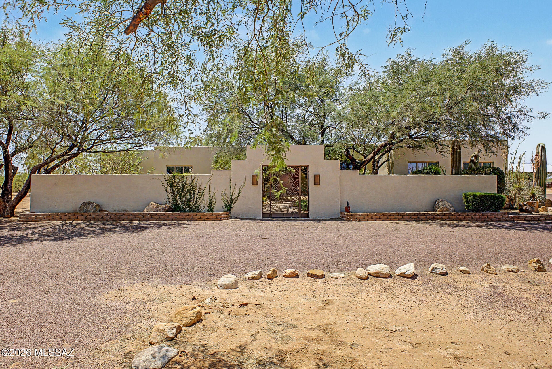 Motivated Seller:  A rare opportunity to own 15 acres (3 connected parcels of land) in Southwest Tucson. This offering features a 4119 square foot move in ready home with a pool and a private well.  Property also has a barn with 6 horse stalls, a tack room and an office/apartment all just steps away from the main house. Home is located 15 minutes from I-19.  This property has room for RV parking/storage.  Plenty of room to add an arena.  Lots of space for all your accessories.  Freshly painted exterior. A must see.