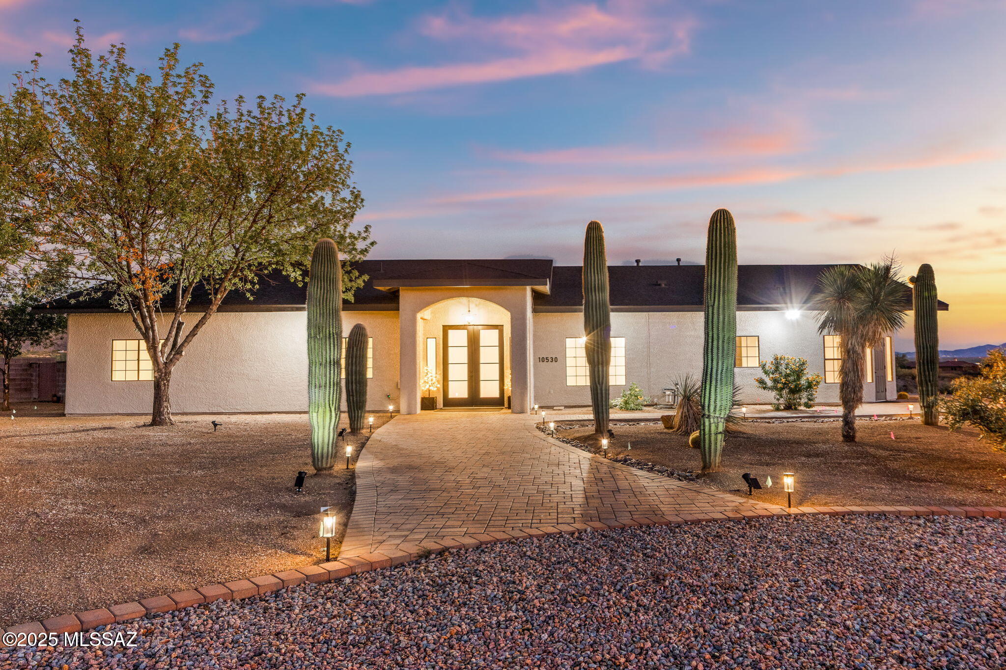 Incredible views! You will be wowed inside and out of this home located on 3.3 acres in a private/secure gated community with just 4 custom homes and NO HOA! This 3 bedroom, 3 bathroom home with a pool has been completely updated and upgraded. Brand new sparkling kitchen with new cabinets, new quartz countertops, and new stainless steel appliances. You will love the cabinet and drawer space, the huge island, the white apron sink, beautiful backsplash, and luxury Zline appliances. New wood look tile flooring throughout the home. New paint. All three bathrooms have all been updated with new cabinets, fixtures, and custom tiled shower/bath surrounds. The living room features a stunning showpiece gas/wood fireplace with custom mantle and rock surround.